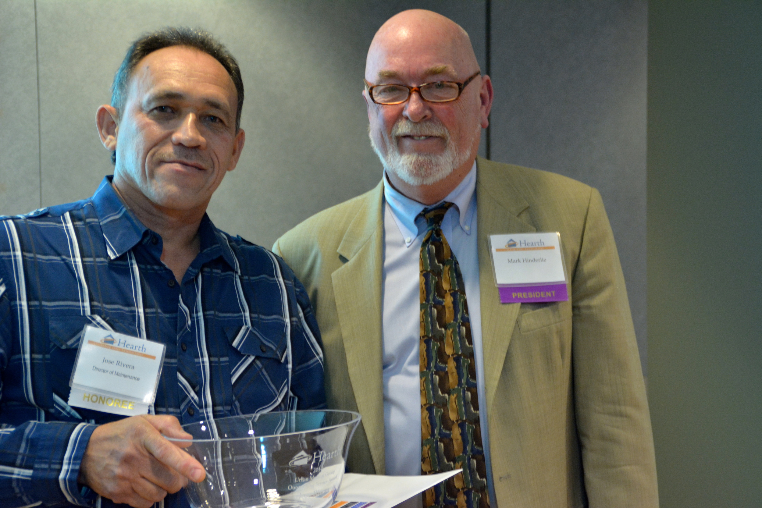  Mark (right) with Urban Medical Group Outstanding Service Award Honoree Jose Rivera. Jose has been the DIrector of Maintenance at Hearth for 17 years. 