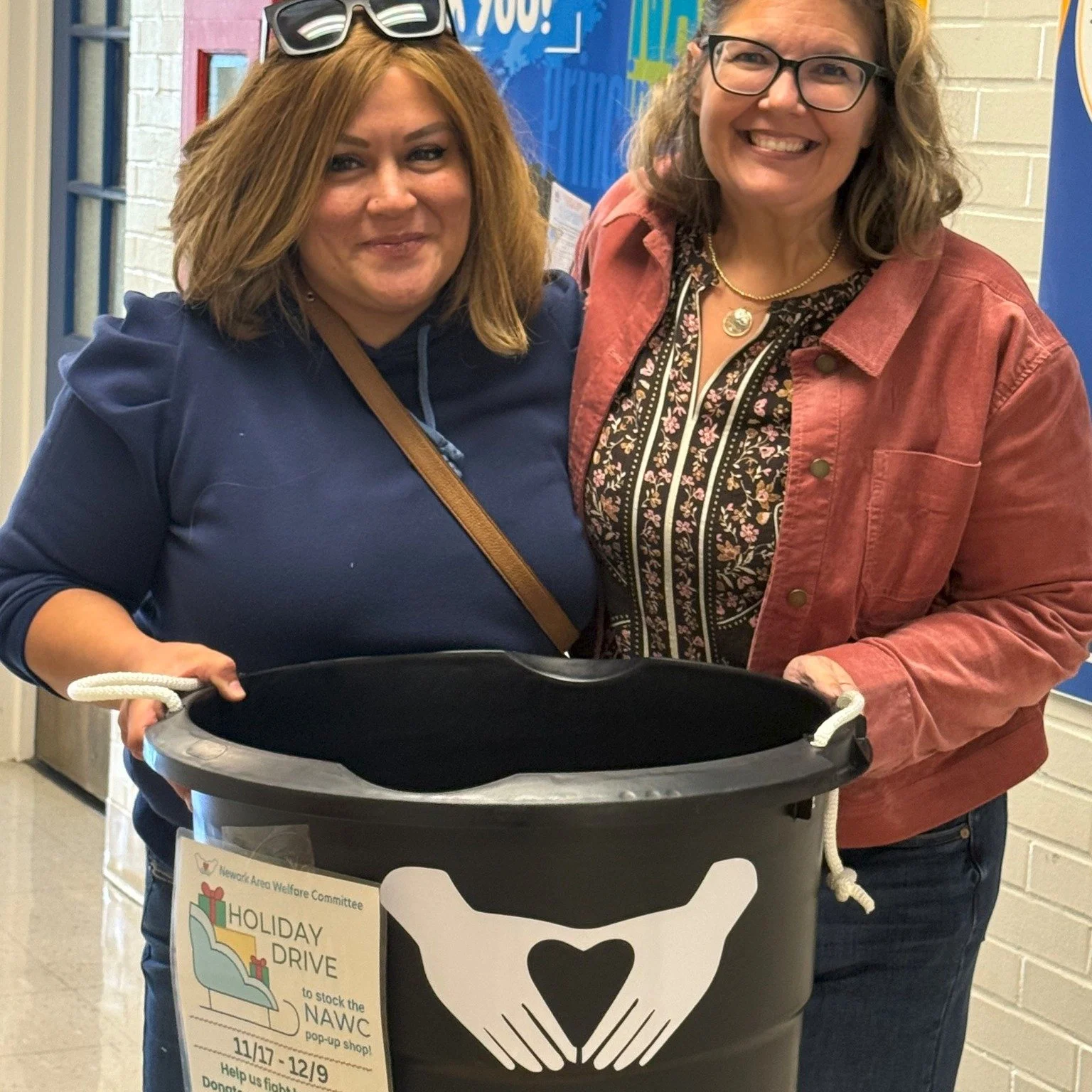NAWC volunteers Stephanie and Lori have been busy delivering food drive bins to nearly every CSD school! 

Our &ldquo;Fill the Bus&rdquo; Holiday Food Drive is rolling through December &mdash; and we need your help to keep it going!

Drop off any non