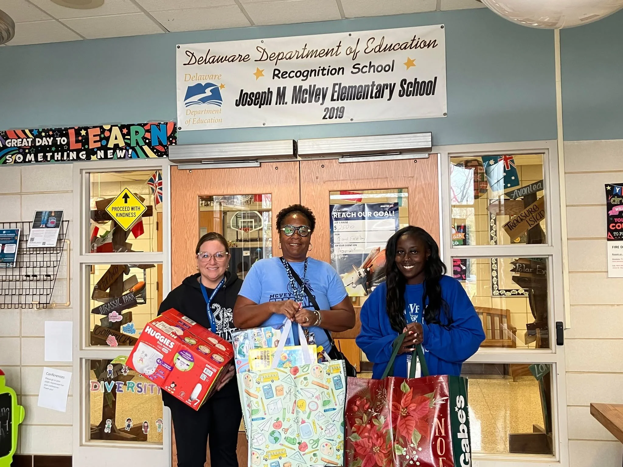 NAWC donated items to Christina School District families in need this holiday season. 

Pictured is Lauren Moccia- Assistant Principal, Dr. Asia Ali-Hawkins- Principal and Gabrielle Mensah- social worker