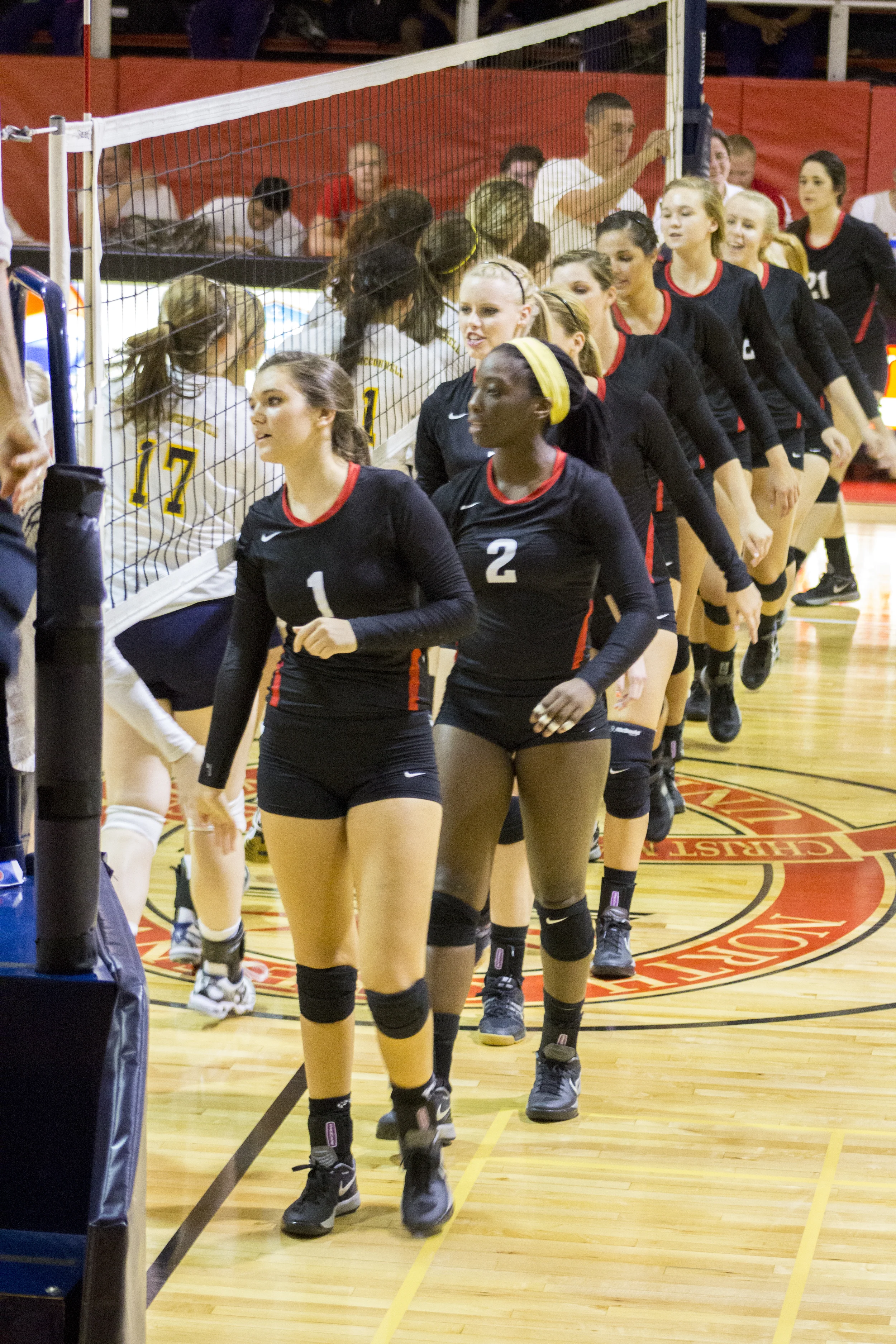 The team shakes hands after the match.