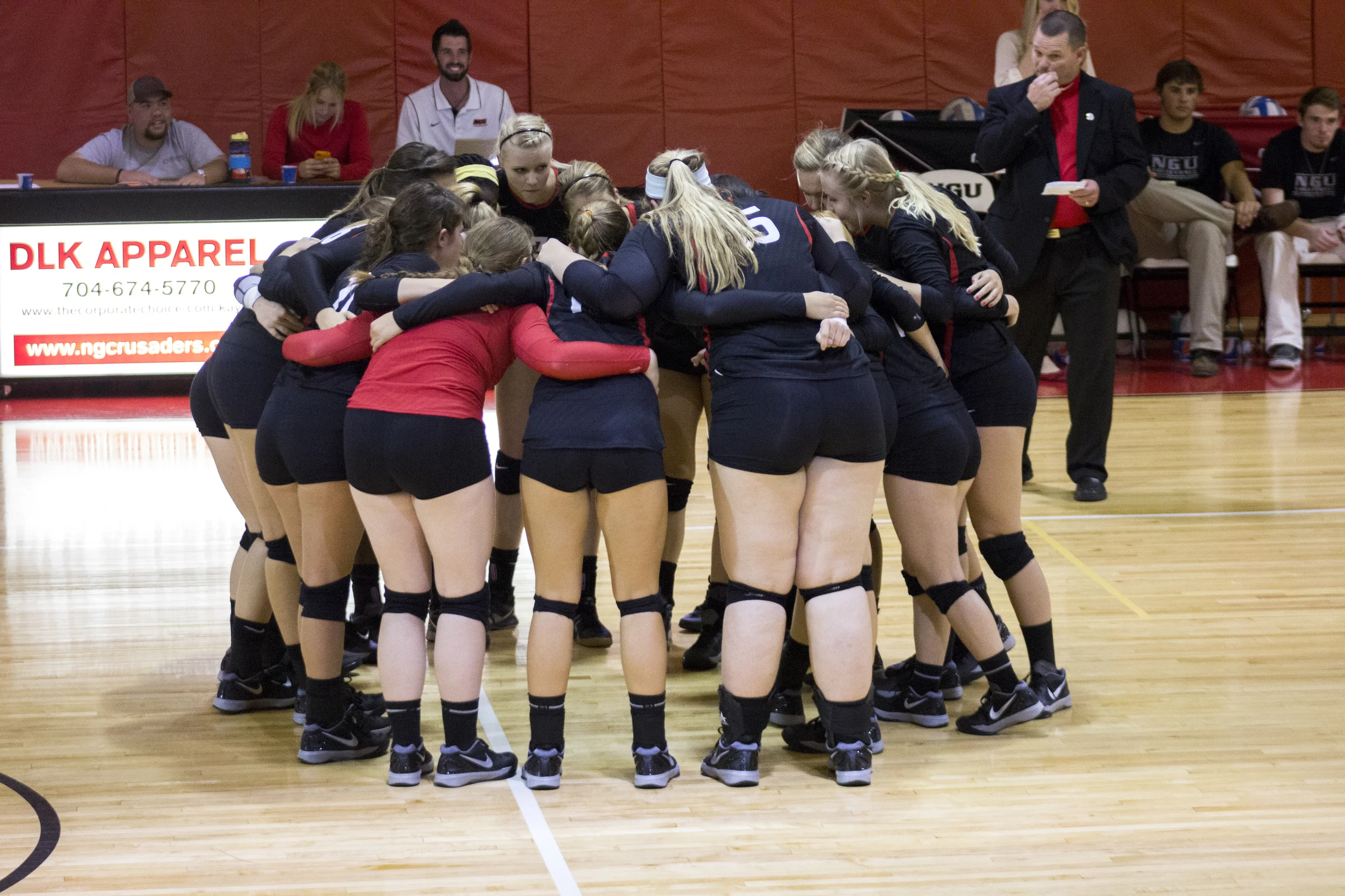 The team huddles up before the start to another match.