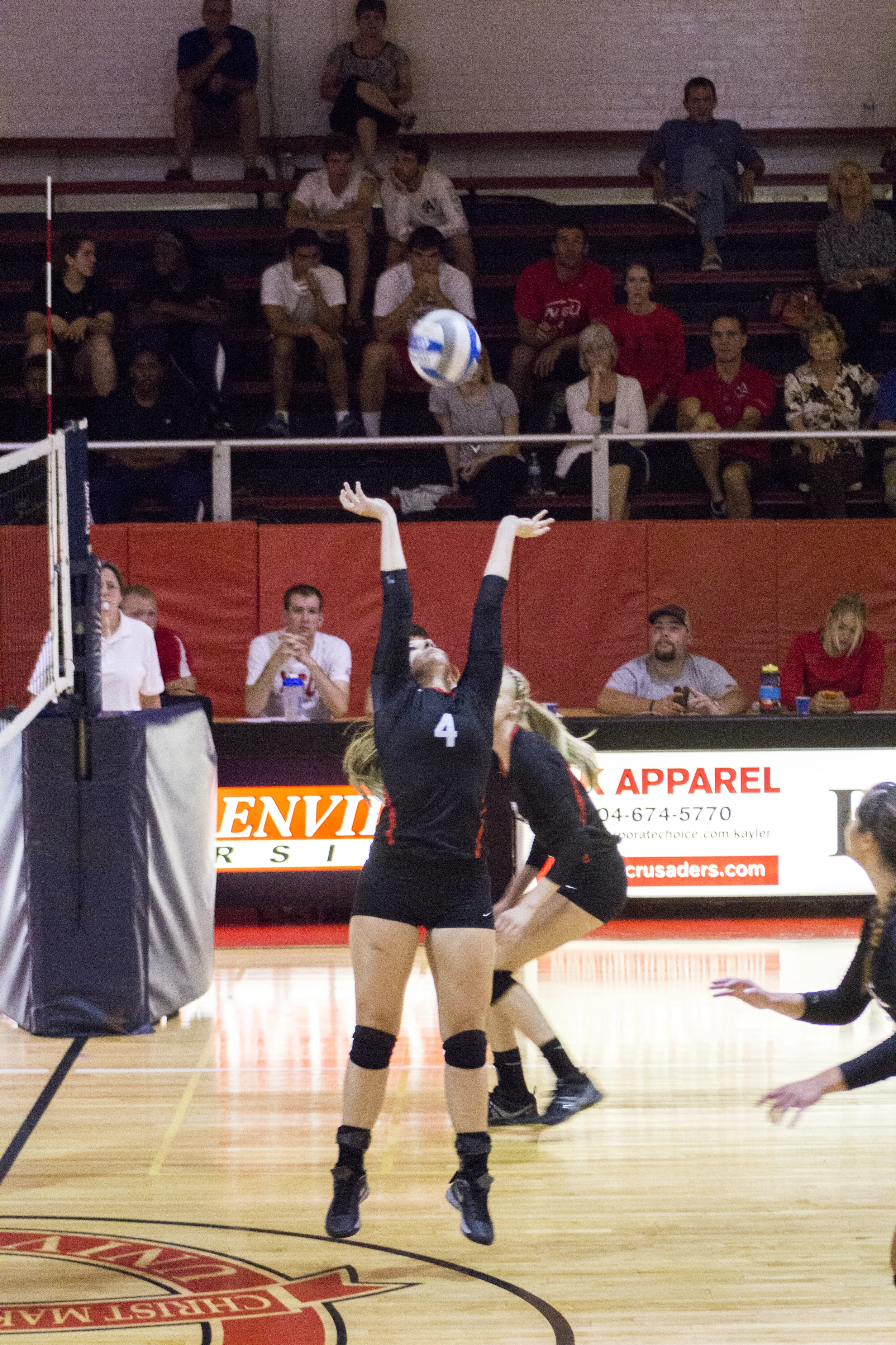 Sophomore Ashlyn Wilkinson sets the ball up for a perfect spike.