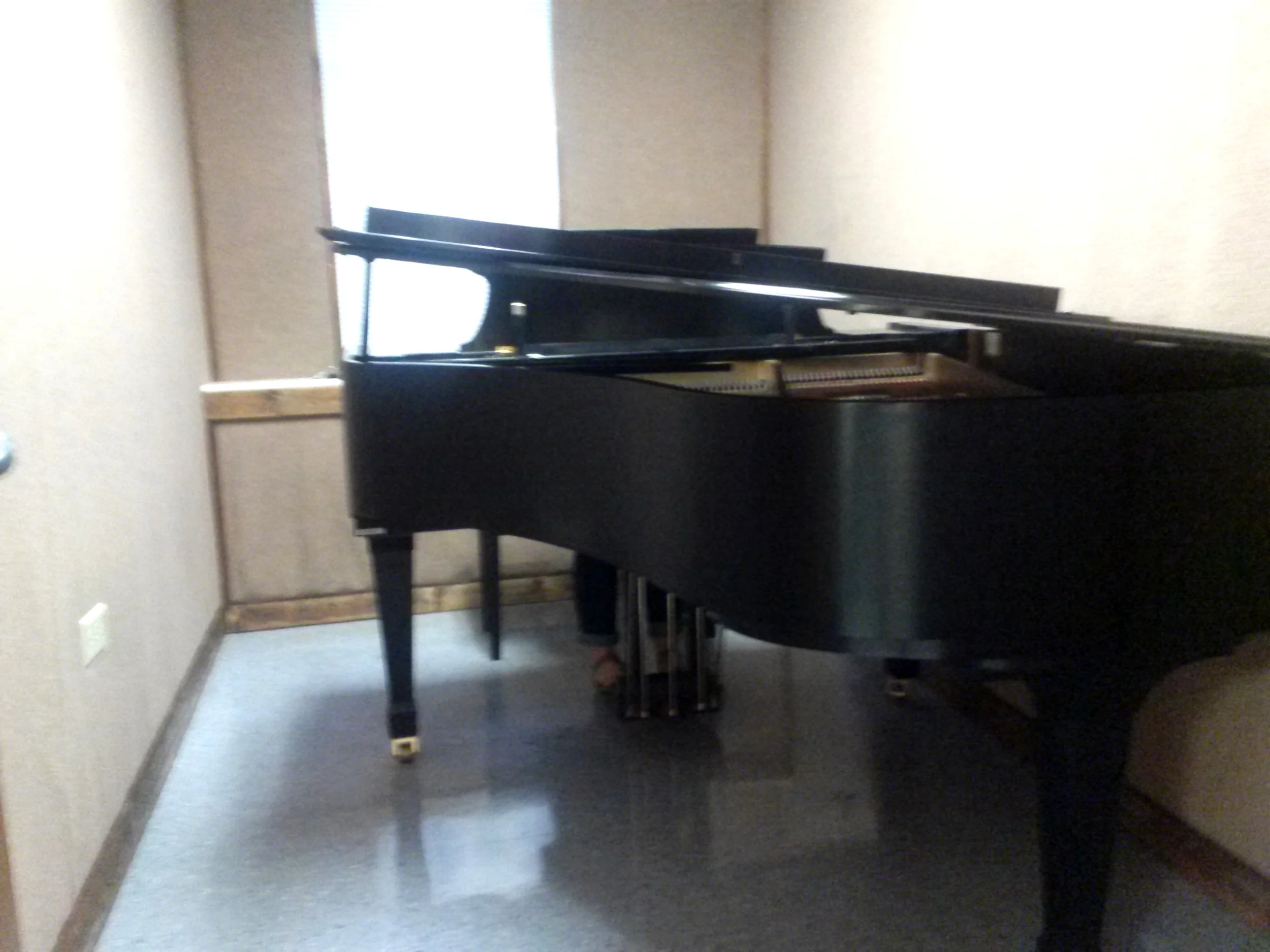 In the music department there are practice rooms where anyone is welcome to play music on the pianos there. 