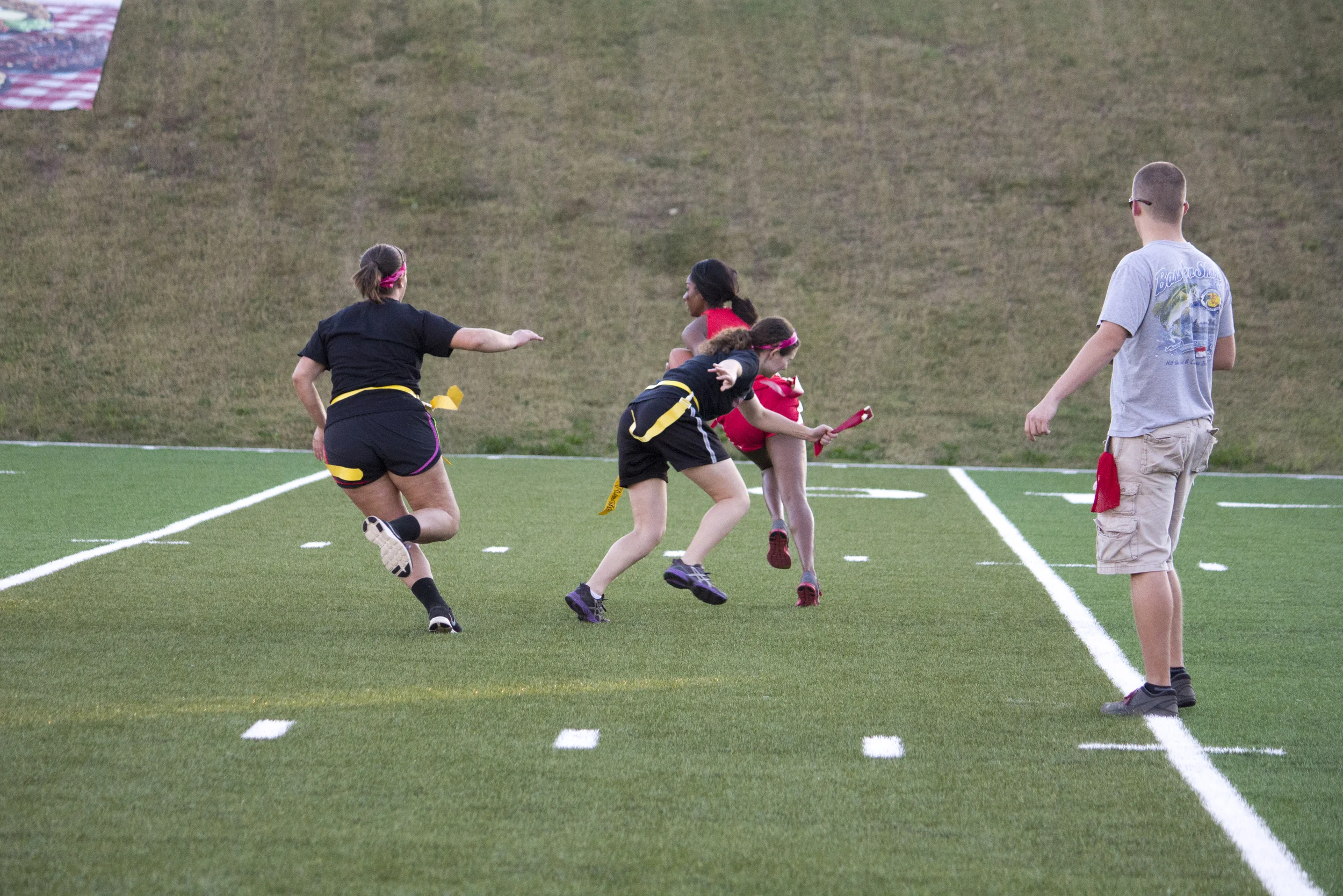 Junior Rachel Alley pulls the flag and snuffs out the Senior team's play before it can even begin. 