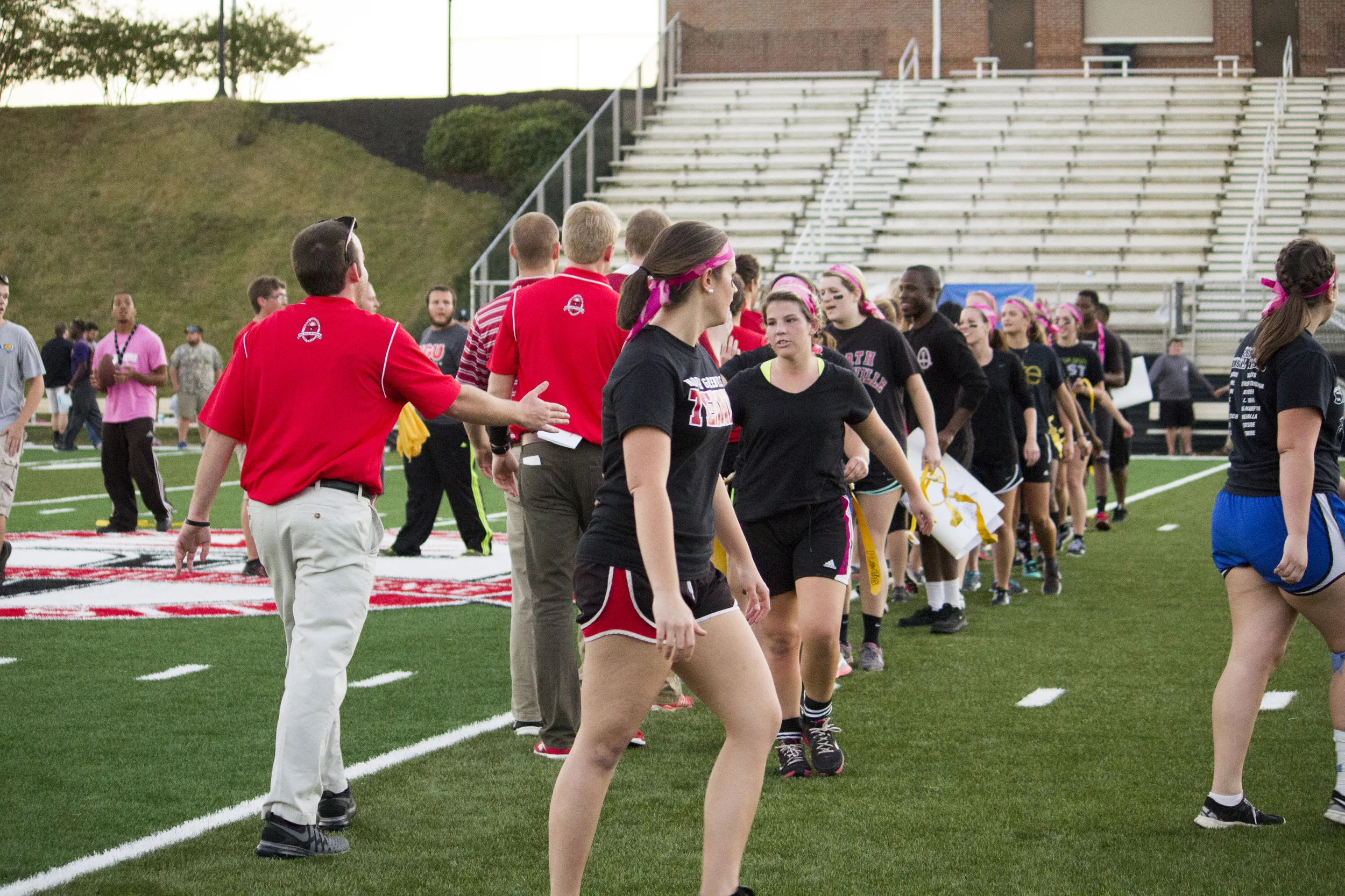 Although it was a very competitive game, both teams shake hands and share smiles at the end of it. 