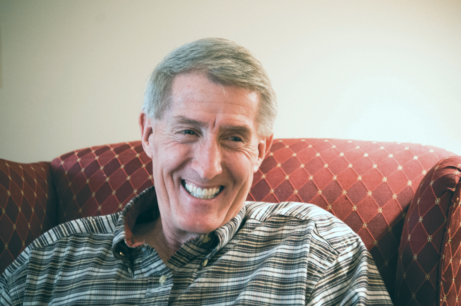 Photo by Abigail Tinker. North Greenville University's former president Jimmy Epting smiles for a photo op.