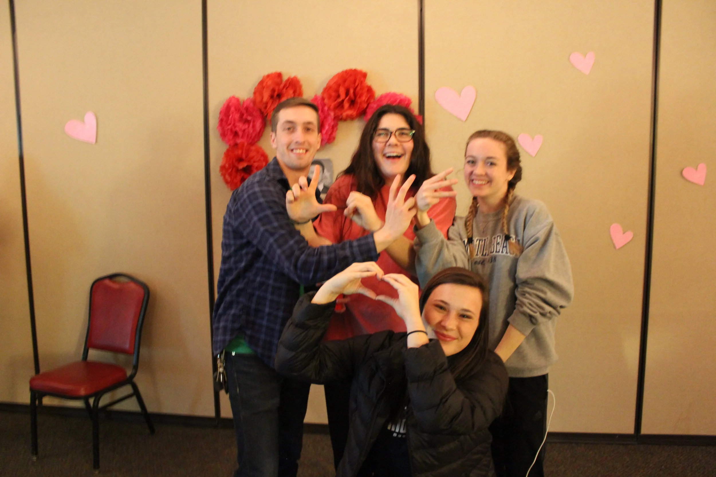Sophomores Emily Brown, Caroline Cabell, Caroline Kirkland, and senior Jonathan Shorter, enjoy the rule change that allowed guys to come in before the movie.