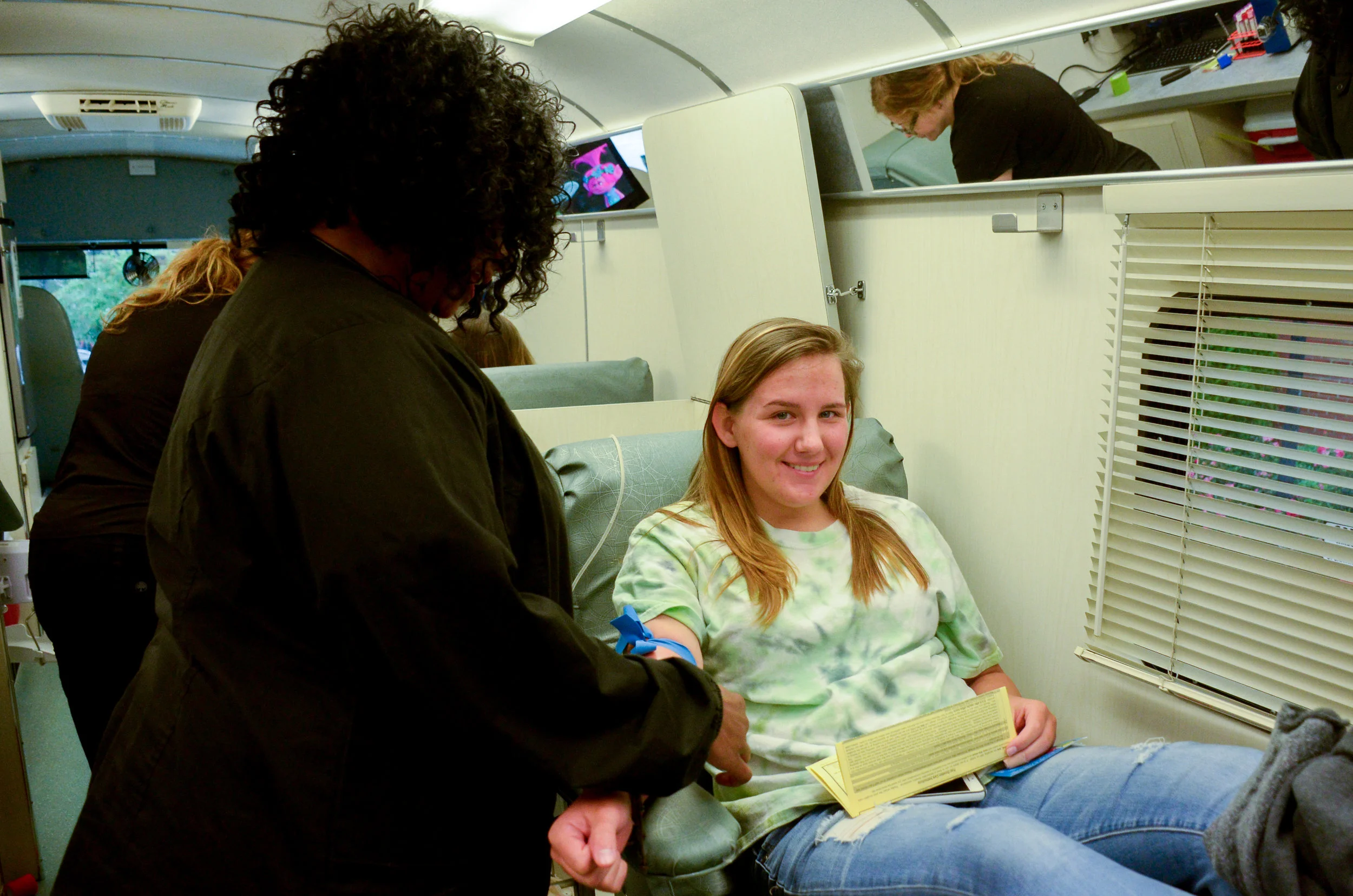 Olivia Hupfauer, freshman, experiences her first time donating. "I've always wanted to do it but never had the opportunity. I saw the bloodmobile and thought this was the perfect chance," says Hupfauer. 
