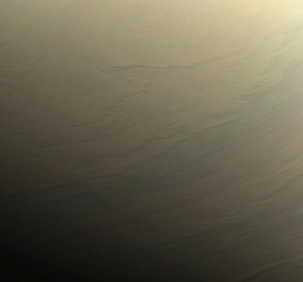 10. “Dreamy Swirls on Saturn” This digitally colorized photograph beautifully defines clouds on Saturn’s northern hemisphere.