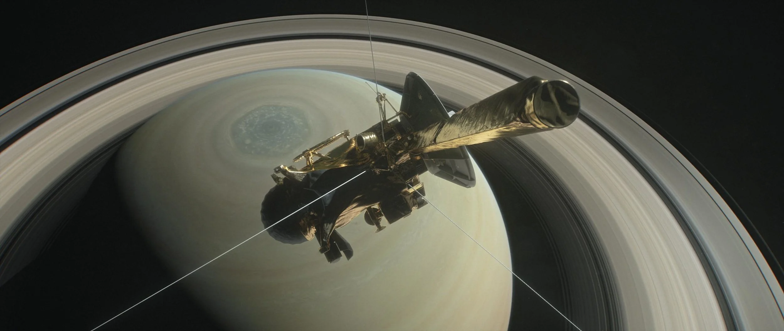 This digitally created image shows NASA's probe Cassini flying high over Saturn. Photo courtesy of NASA.