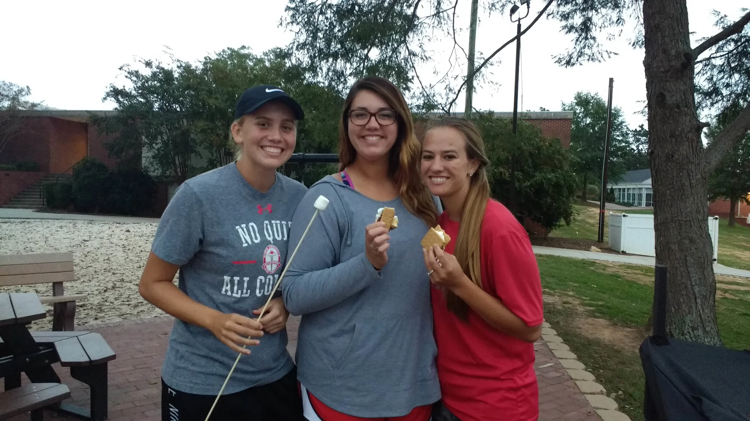 Taylor Koon (Freshman), Brooklyn Fort (Senior) and Morgan Herlong (Senior) posing with their s'mores. 