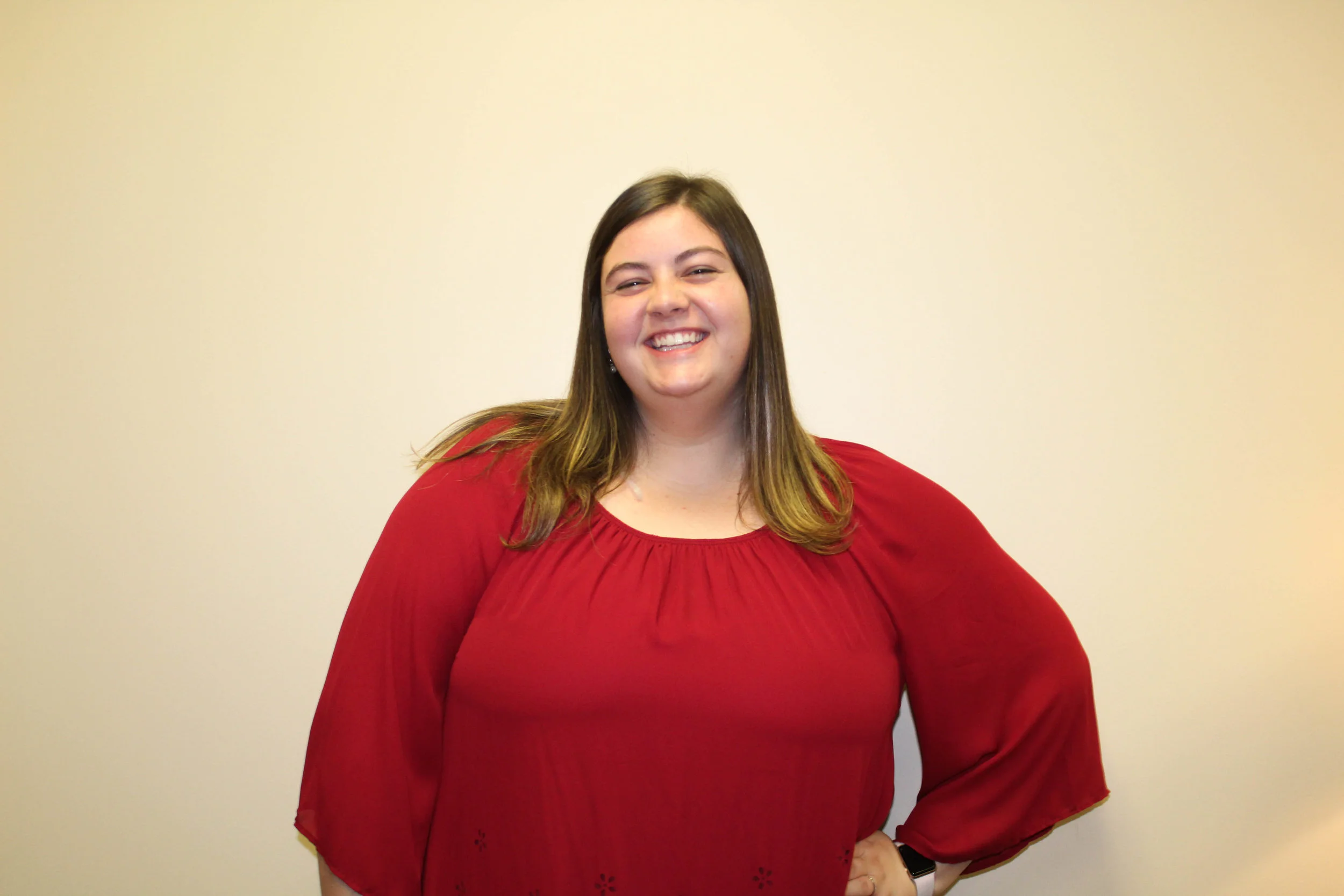 Junior early childhood education major Kayla Gibson sports her red shirt at church.