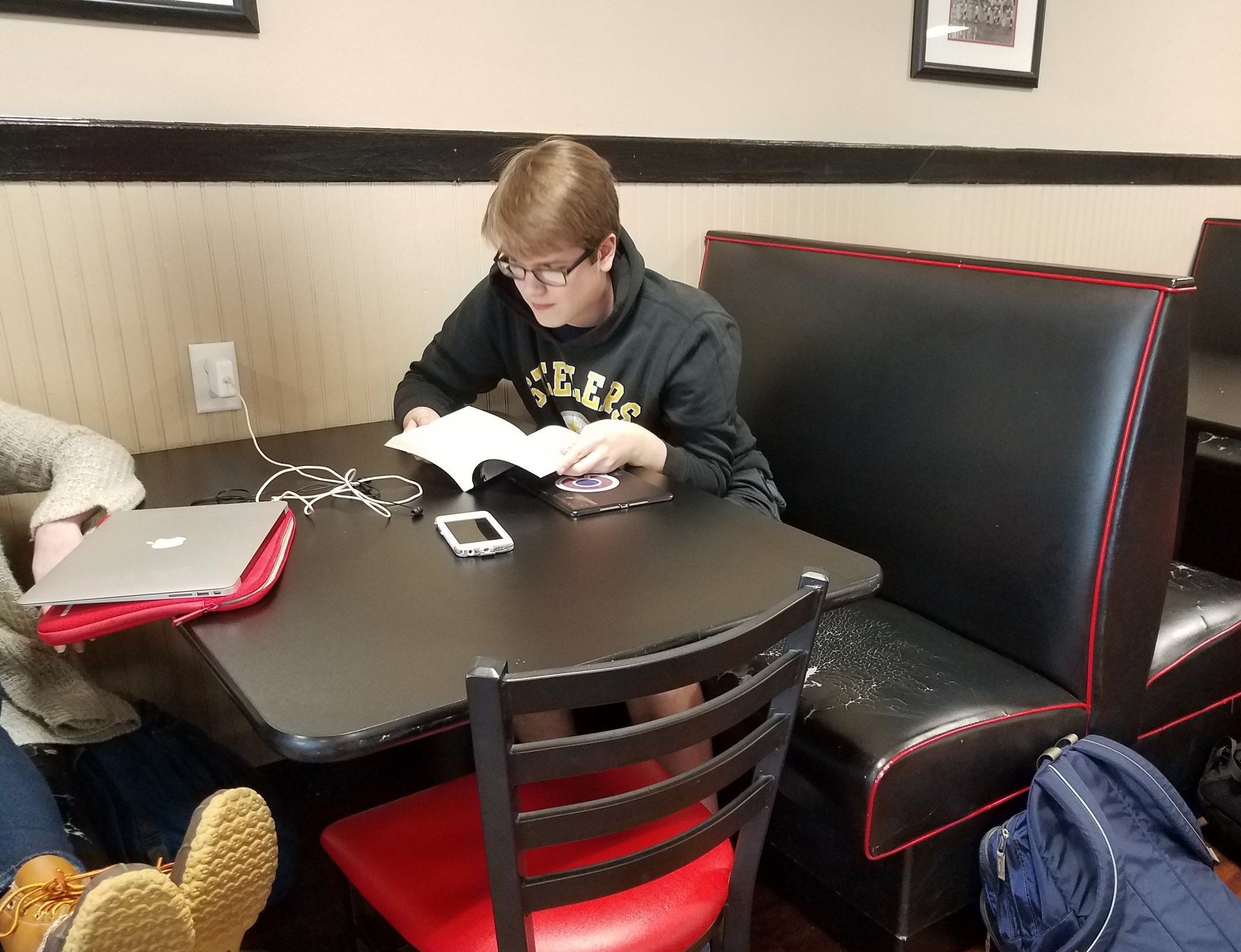 Avery McGrail studies in the Student Center