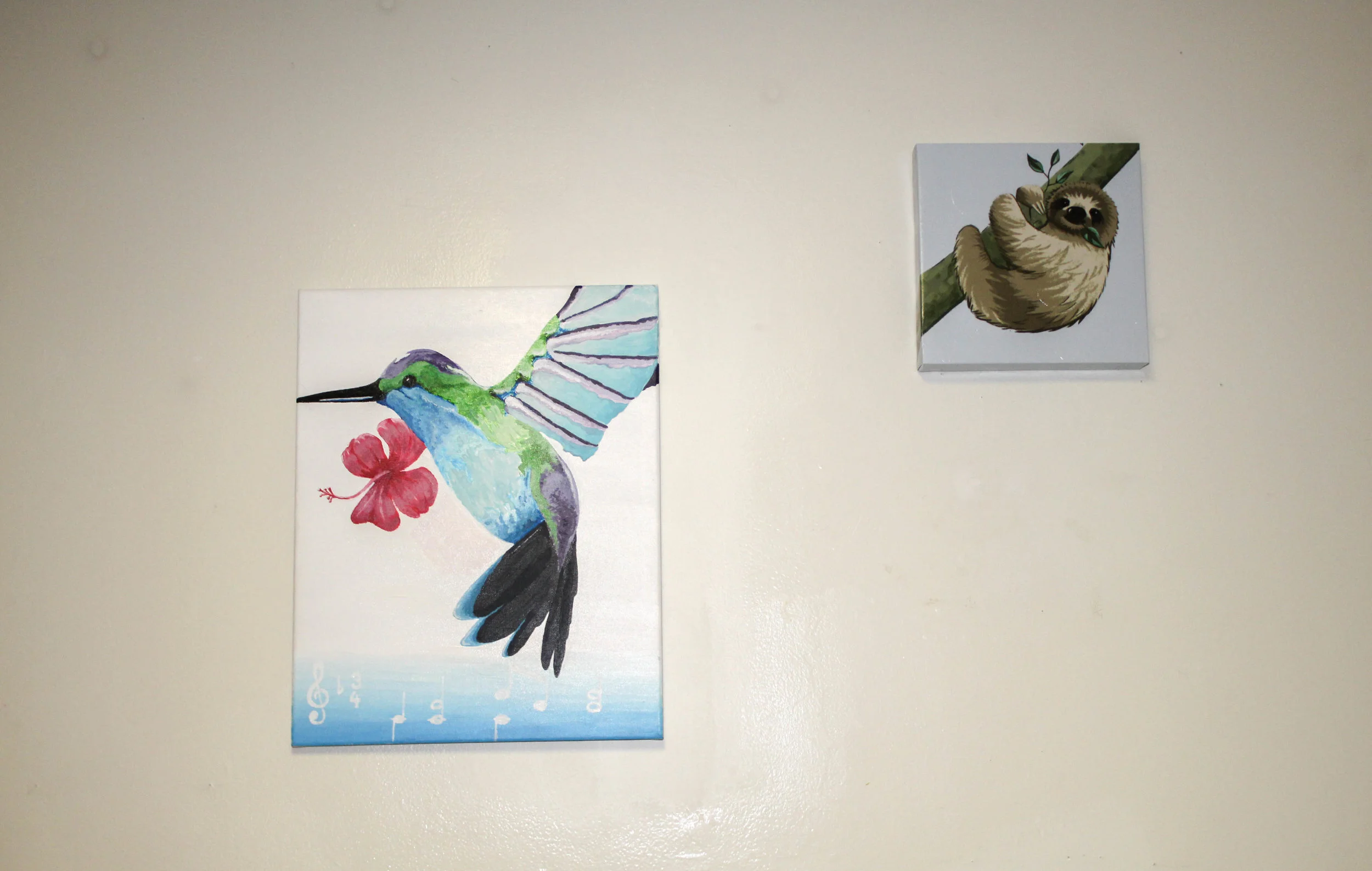 Gibson also displays pictures of different animals in her room. The painting of the sloth was painted by her friend.