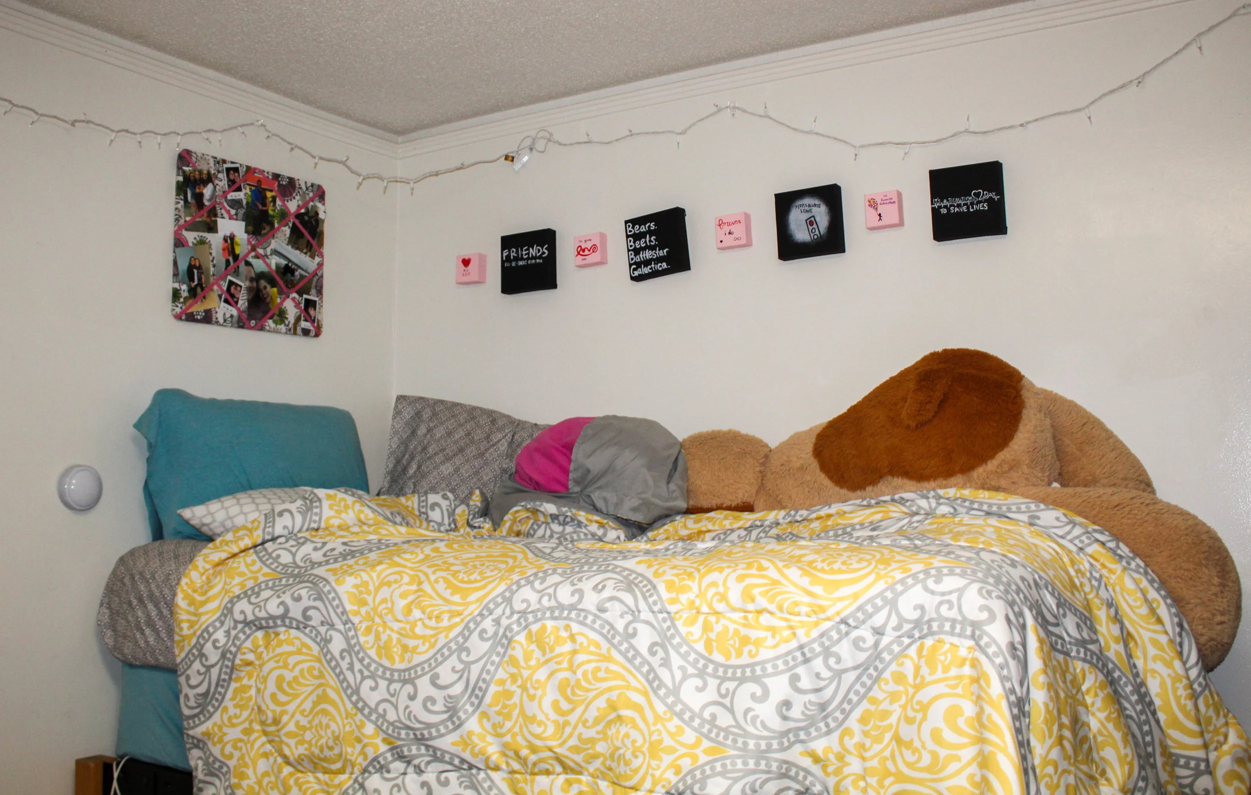 Victoria Darr, junior, shows off her favorite color, yellow, by the choice of vibrant comforter.