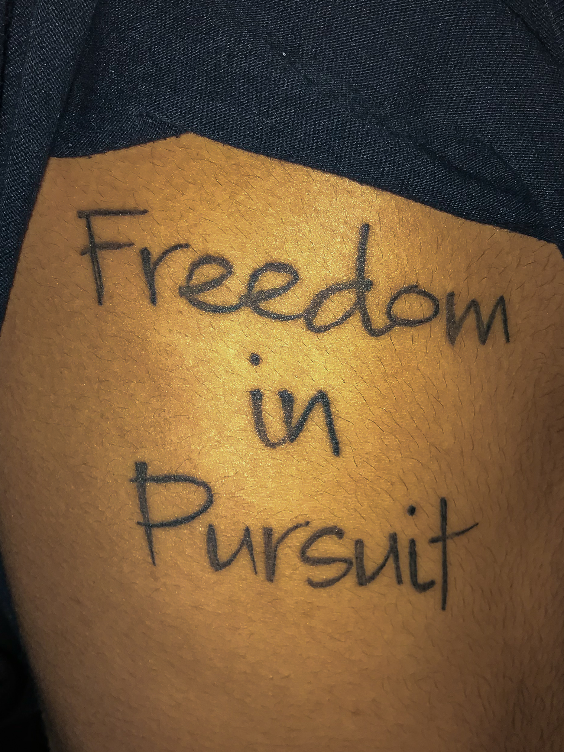 This is Isaac Langdon. Landon got this tattoo after feeling in bondage in sin that was weighing him down. After a weekend trip with a friend, Landon realized what freedom in pursuit truly meant. When Landon pursued the Father, he was able to find freedom because he was pursuing freedom. Landon was able to also find joy because he was pursuing joy.