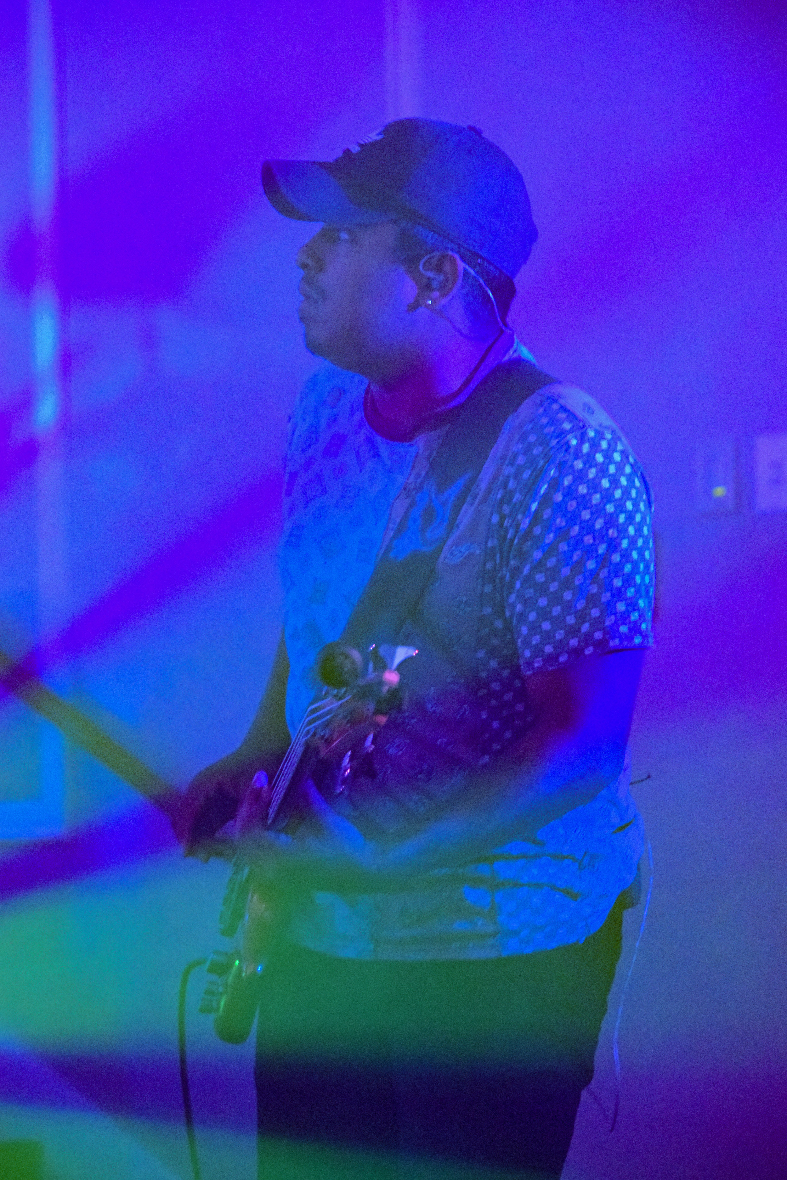 Senior bass player Lee Palacios looks to Nelson as he awaits the next cue.
