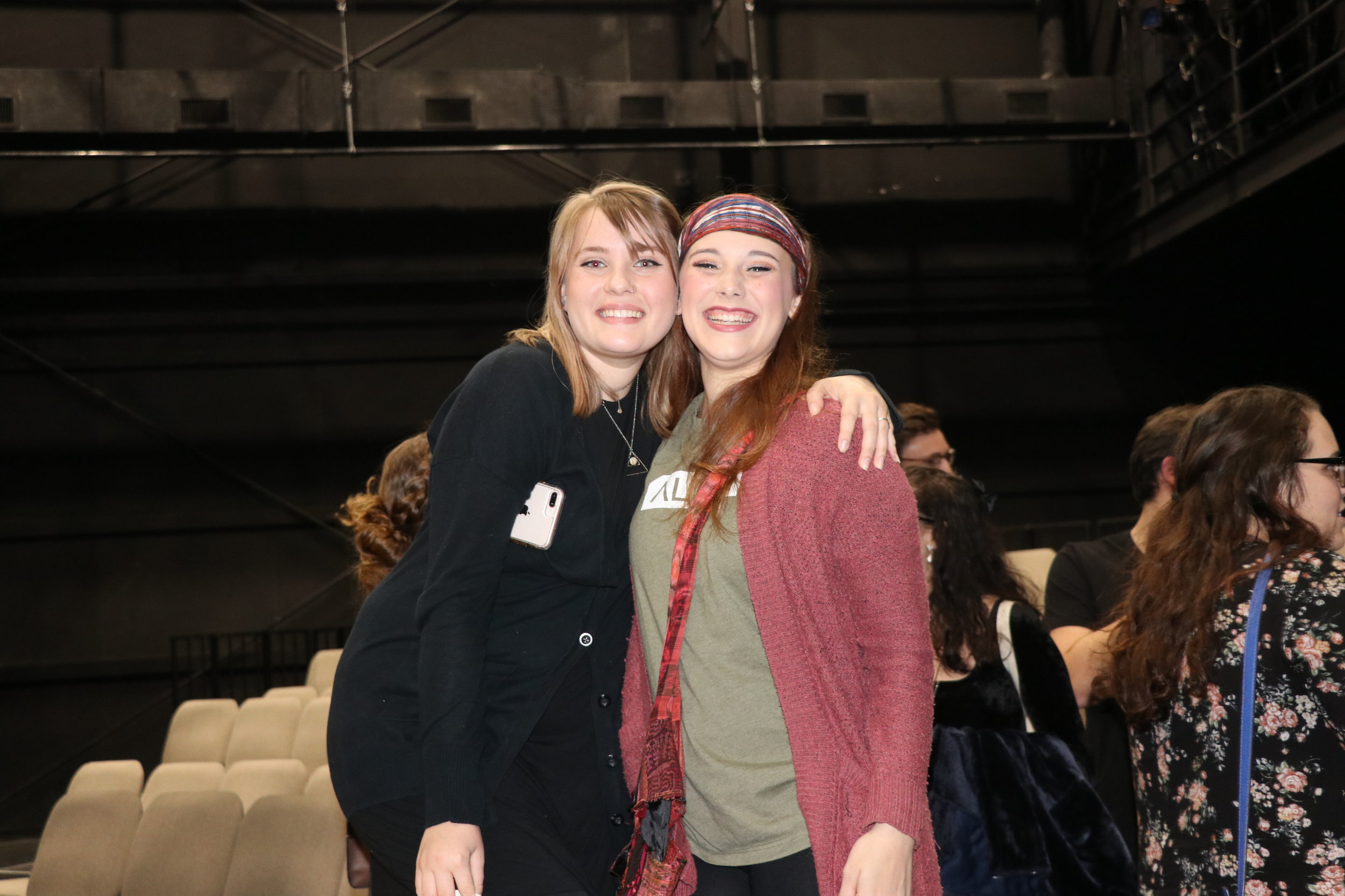 Marlee Daniel, assistant stage manager (sophomore) and Rachel Gasdia (sophomore) hug it out after killing it on opening night.