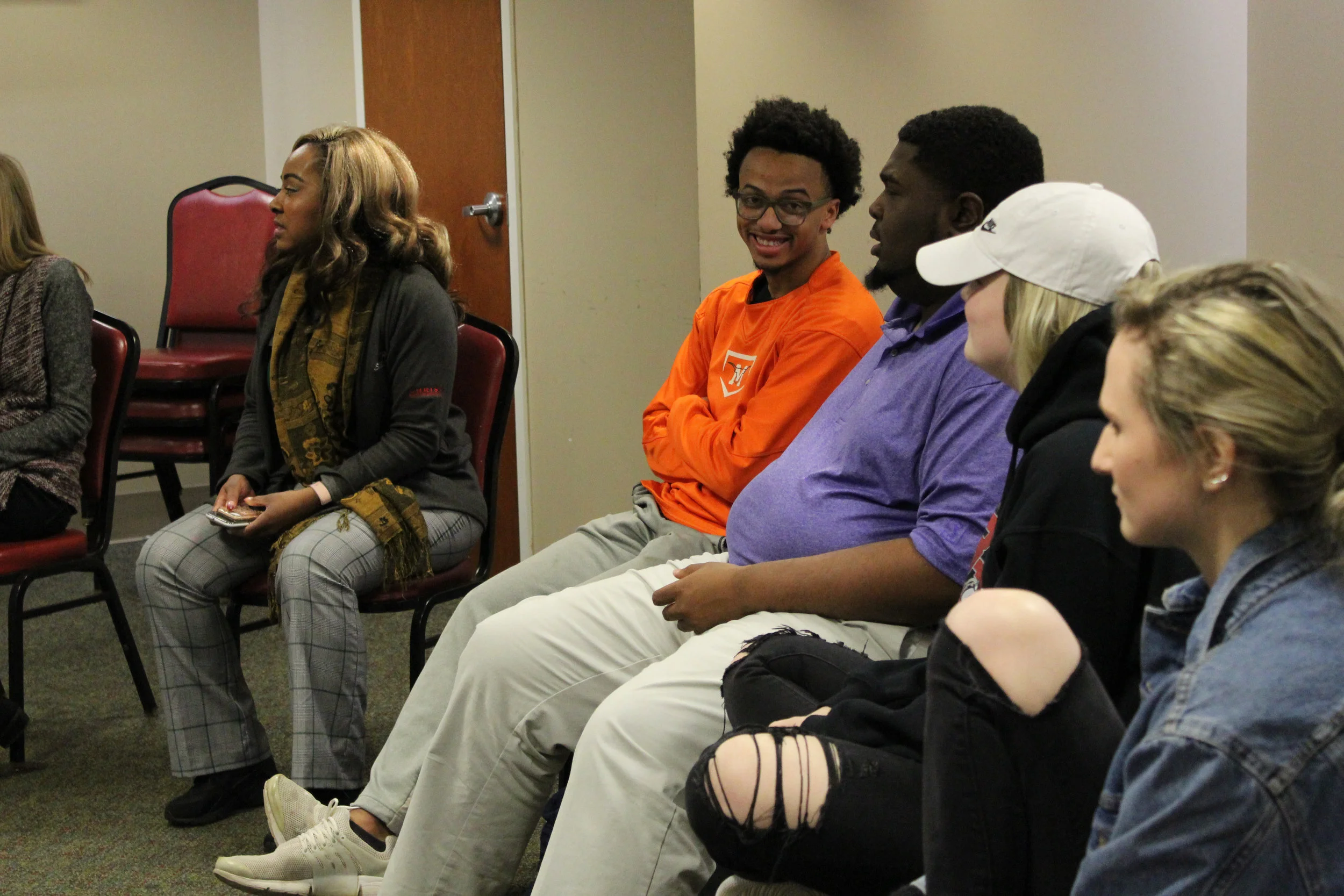 The other side of the room introduces themselves including students Issac Langdon (sophomore), Paul Scotland (freshman), Logan Jolley (freshman), and Savannah Laughter (sophomore).
