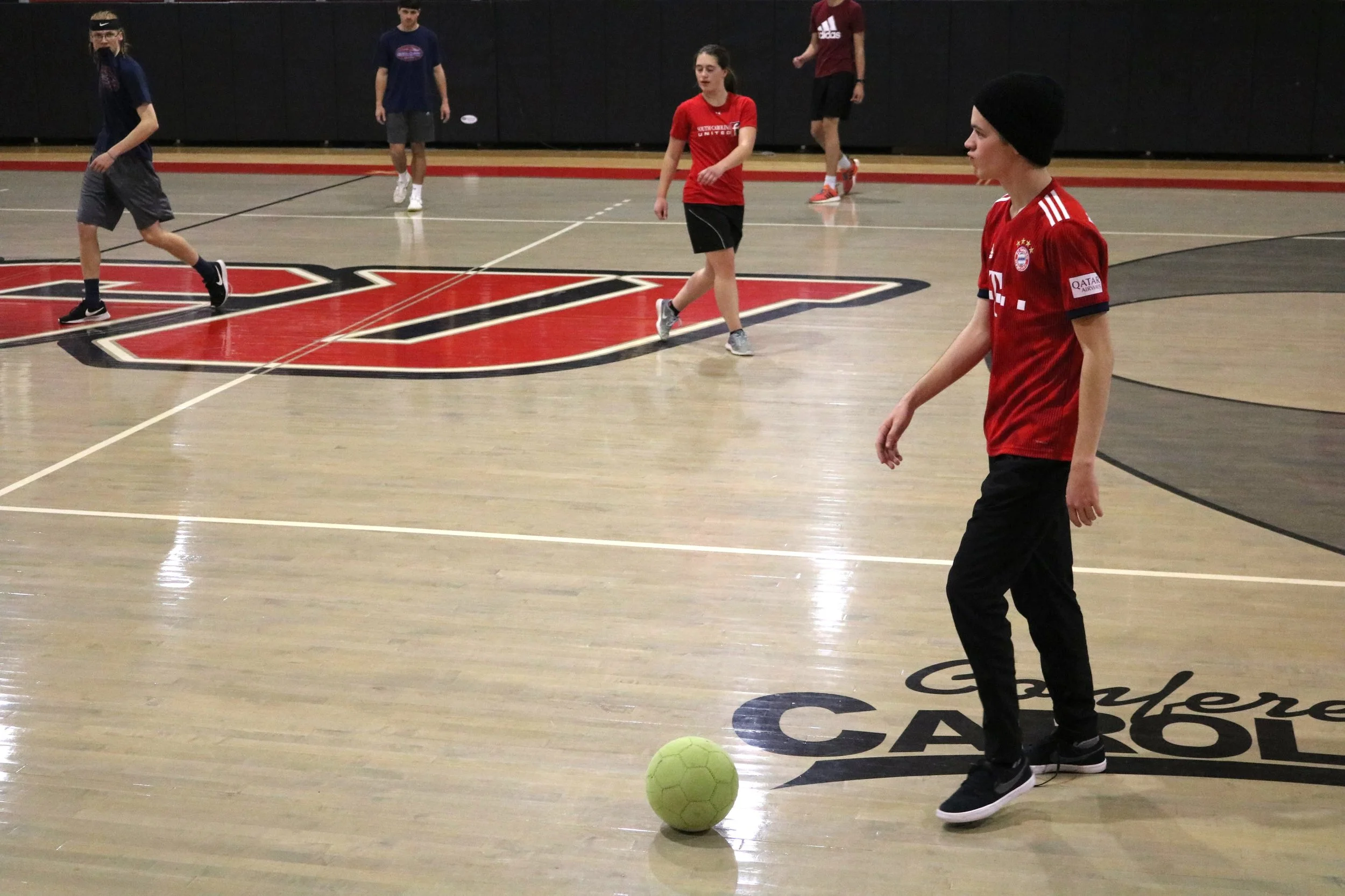 Junior Jackson Millsaps looks for an open teammate as he takes the ball down the court.