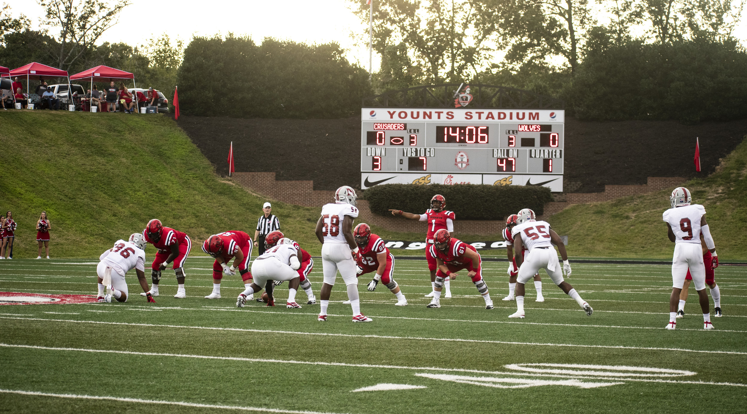 Both teams get set up to resume the game.
