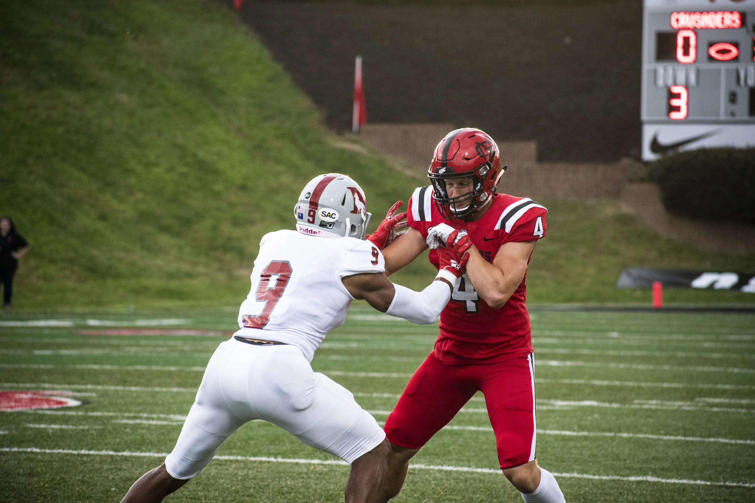 Junior Lucas Catalfomo (4) tries to dodge the Newberry player.