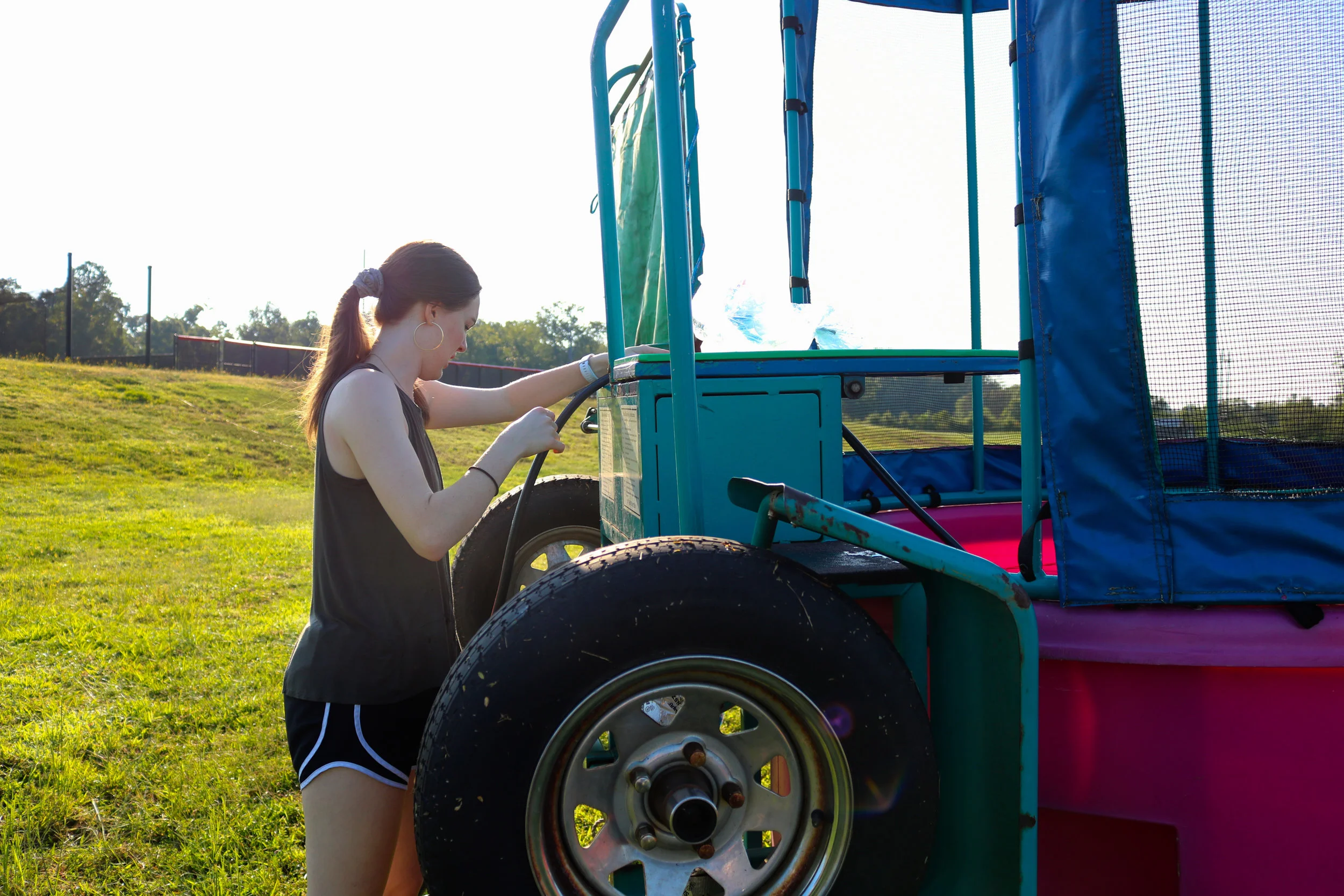 Kailyn Horn, senior, fills up the dunk tank to help raise money for their medical missions trip.