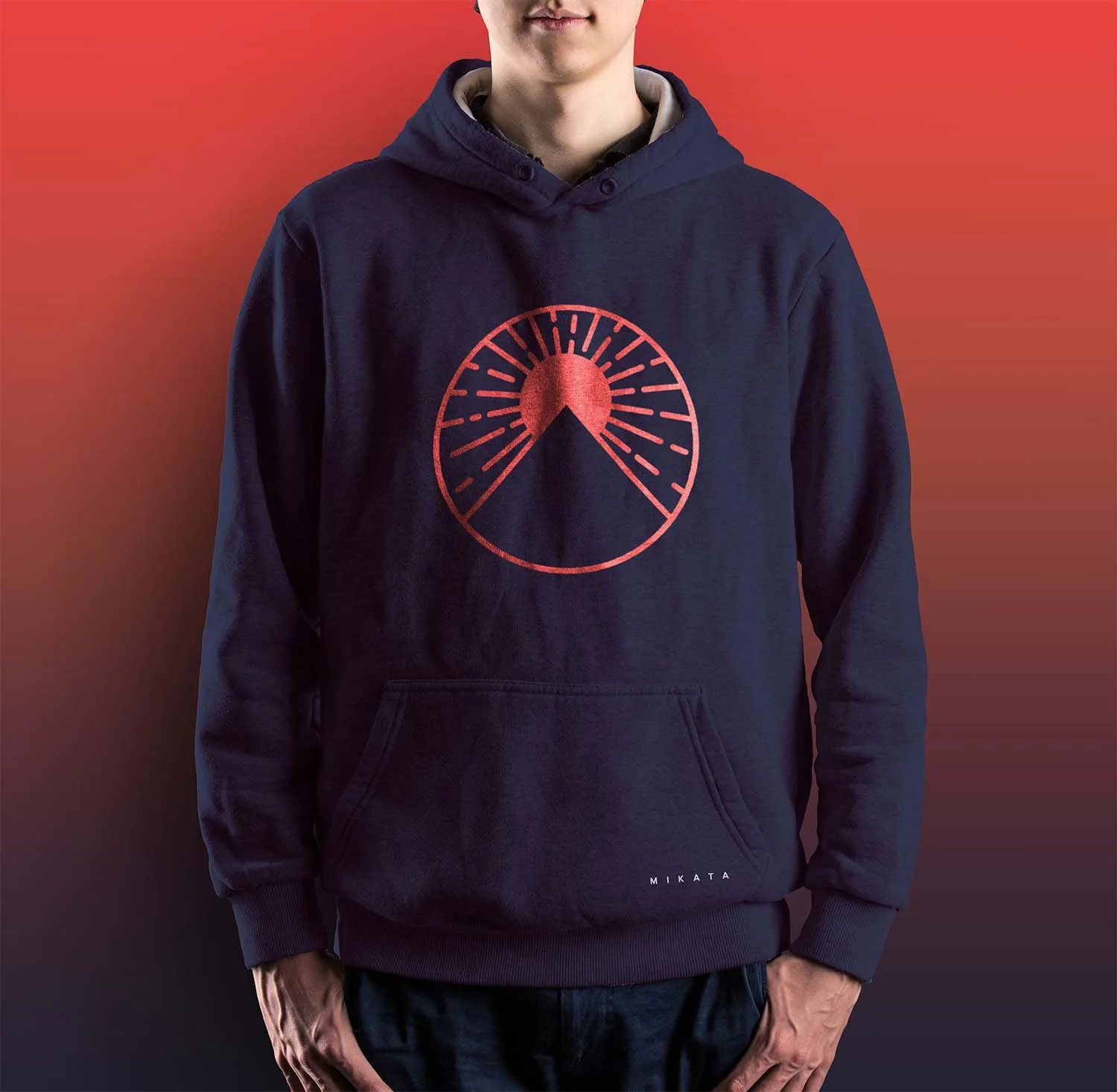 Model wearing a blue hoodie with red mikata logo positioned center