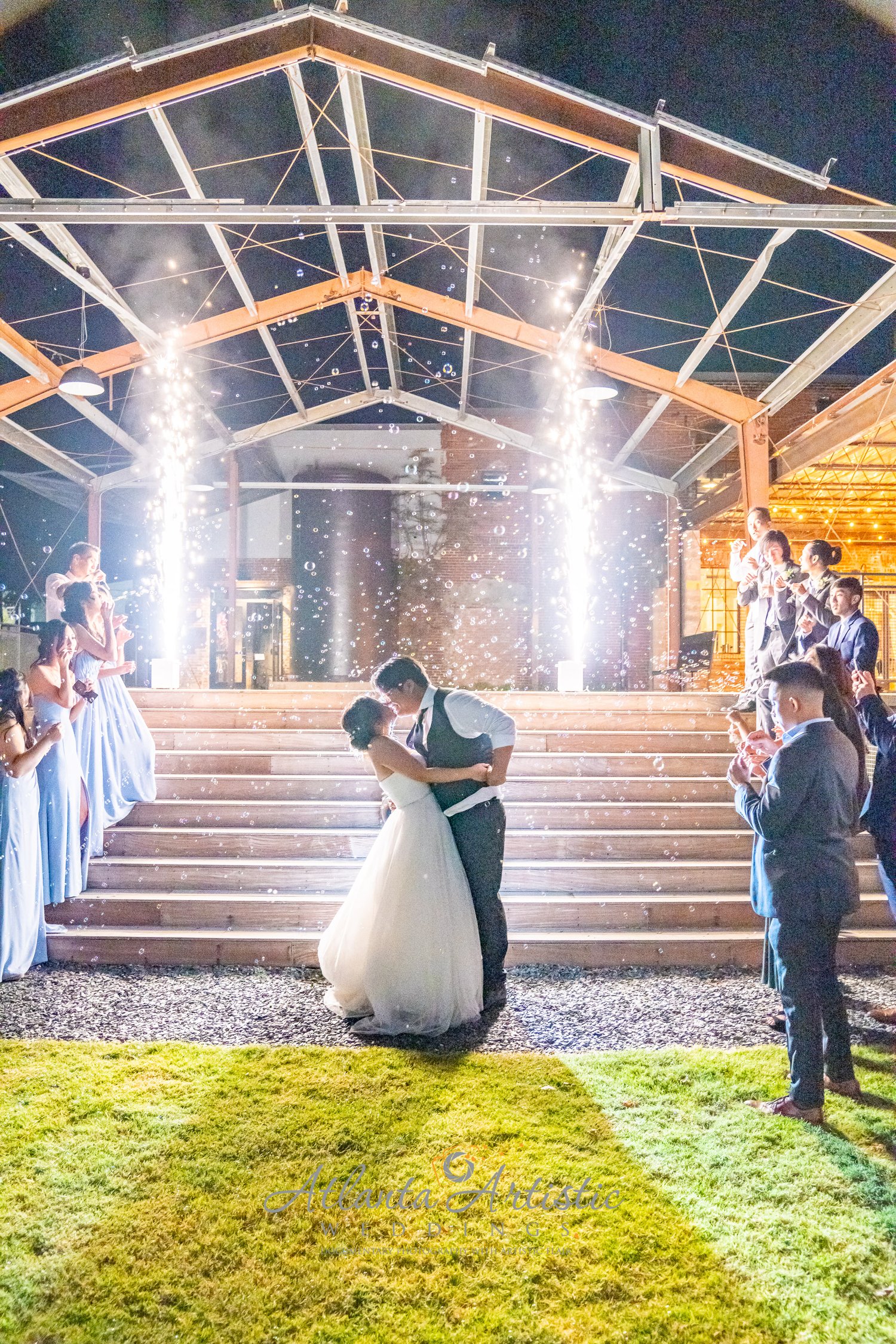 Photography by the Atlanta's Best Wedding Photographers at AtlantaArtisticWeddings capture the Candid and Intimate Moments with a Photo Documentary Style by masterning lighting and Night photography