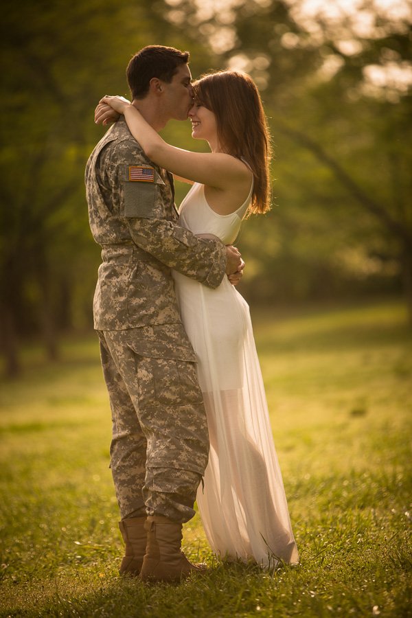 The Atlanta wedding photographer at AtlantaArtisticWeddings tells your wedding story with Photodocumentary photography see the best of their photography on Instagram military couple engagement shot at Piedmont Park