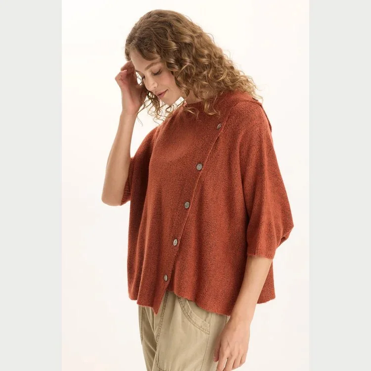 The osiris asymmetrical button detail knit poncho sweater by XCVI in sprightly poppy color