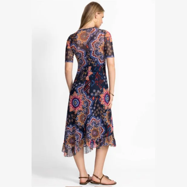 The mesh elbow sleeve asymmetric hem dress in padme print/color combination by Johnny Was