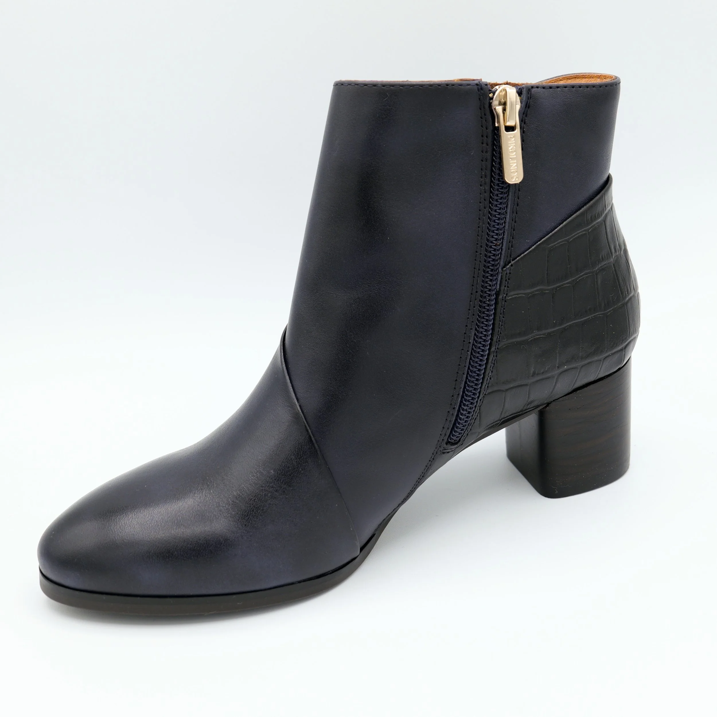 The calafat heeled bootie in space black by Pikolinos