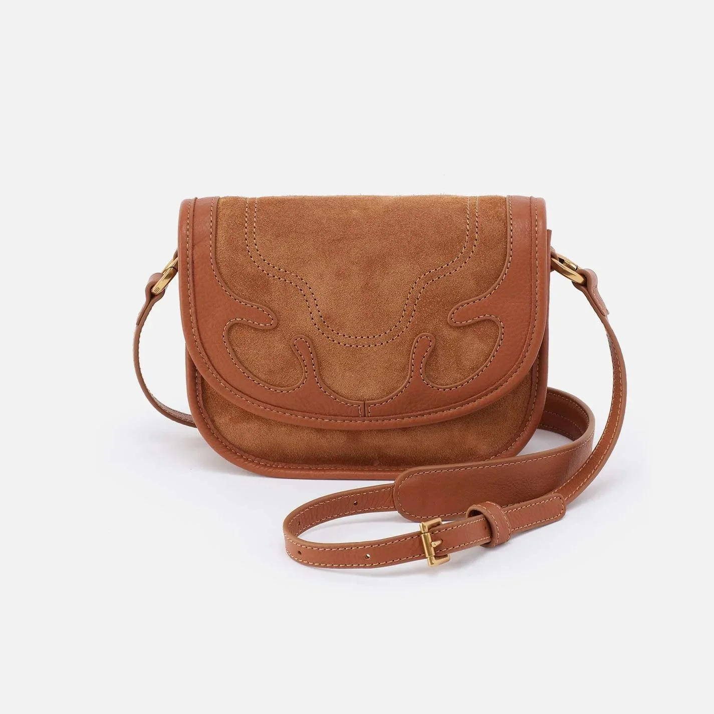 The kiva small crossbody handbag by Hobo in oak barrel colored leather