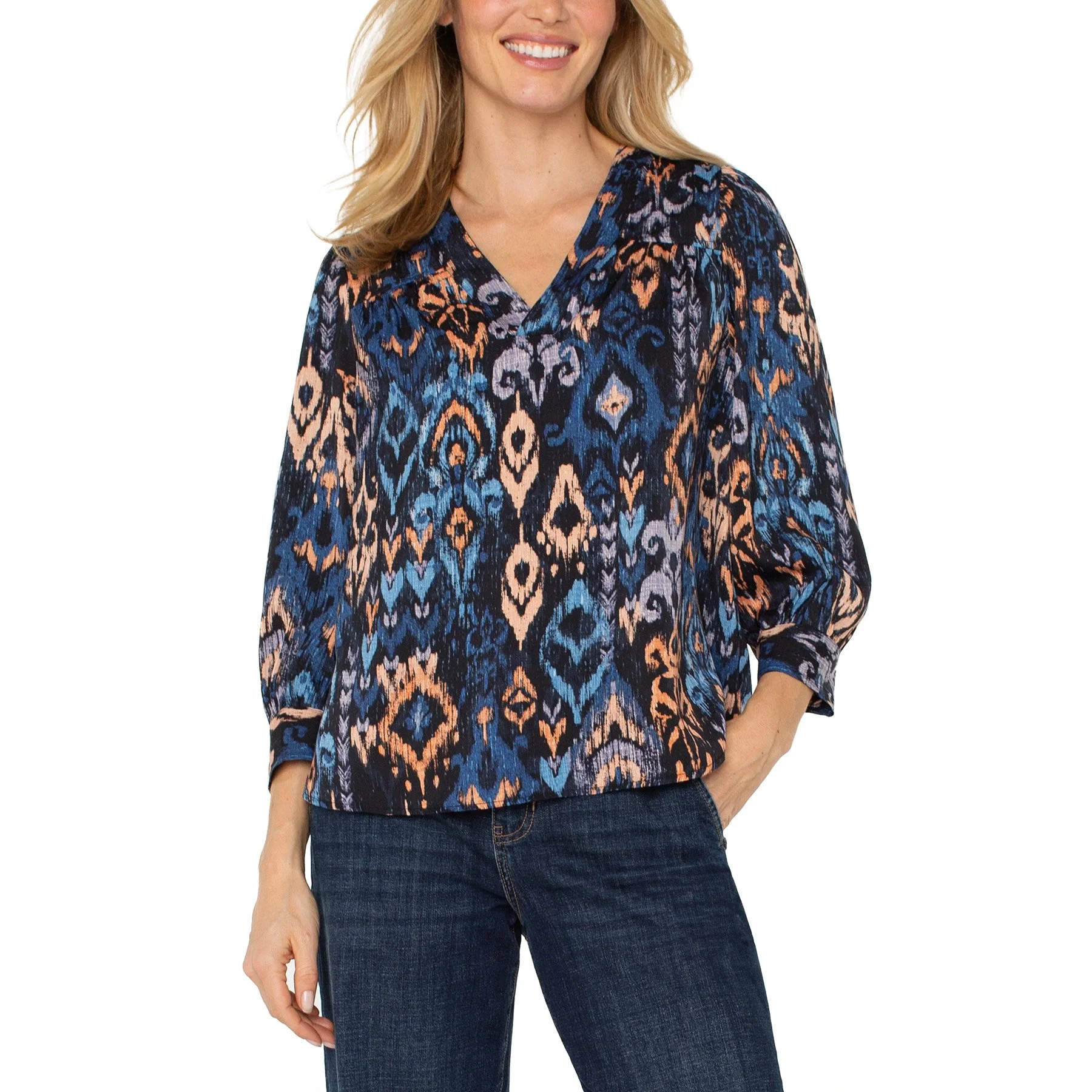 The 3/4 sleeve v-neck popover woven blouse by Liverpool in blue multi ikat print