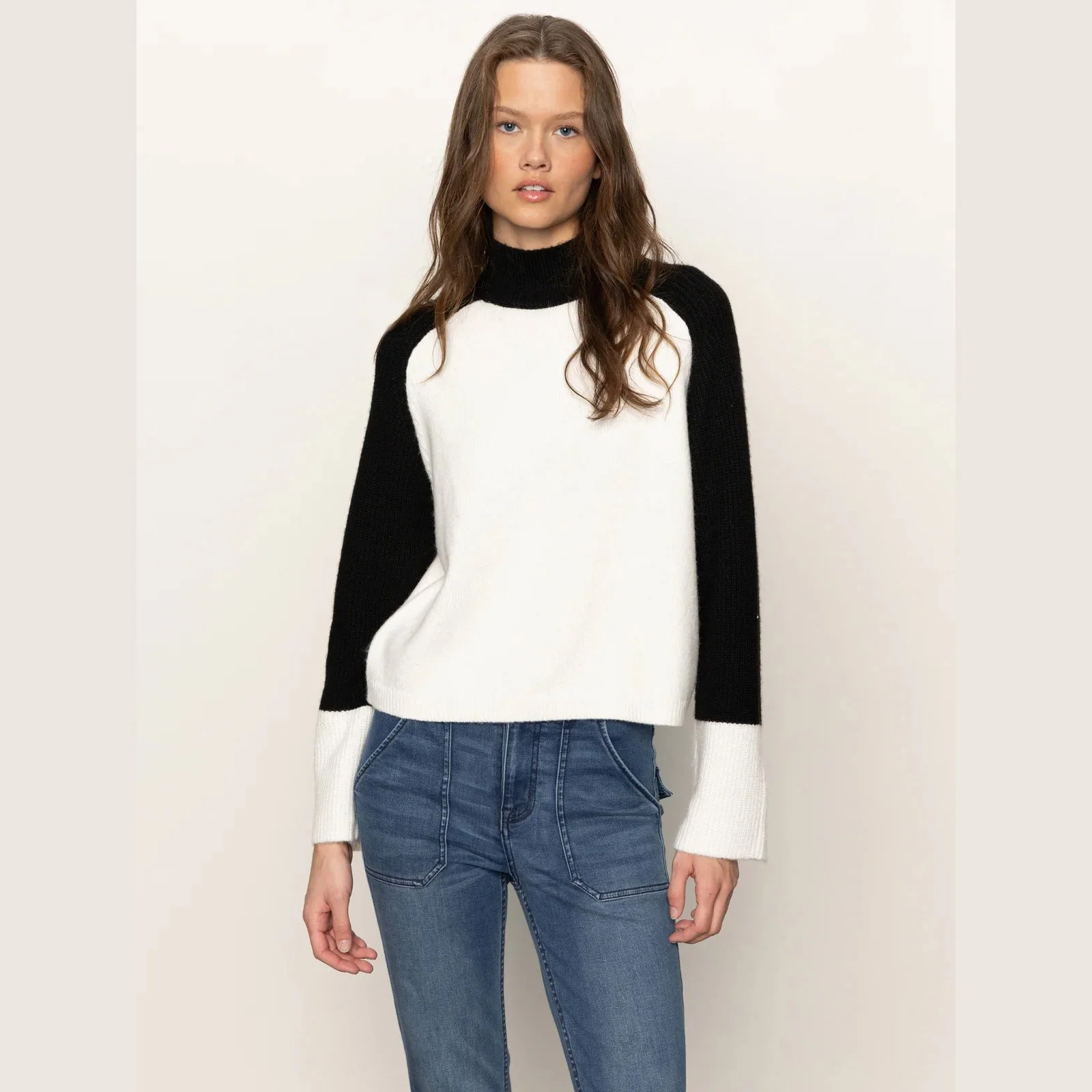 The downtown mock neck sweater by Sanctuary Clothing in black/chalk color combination