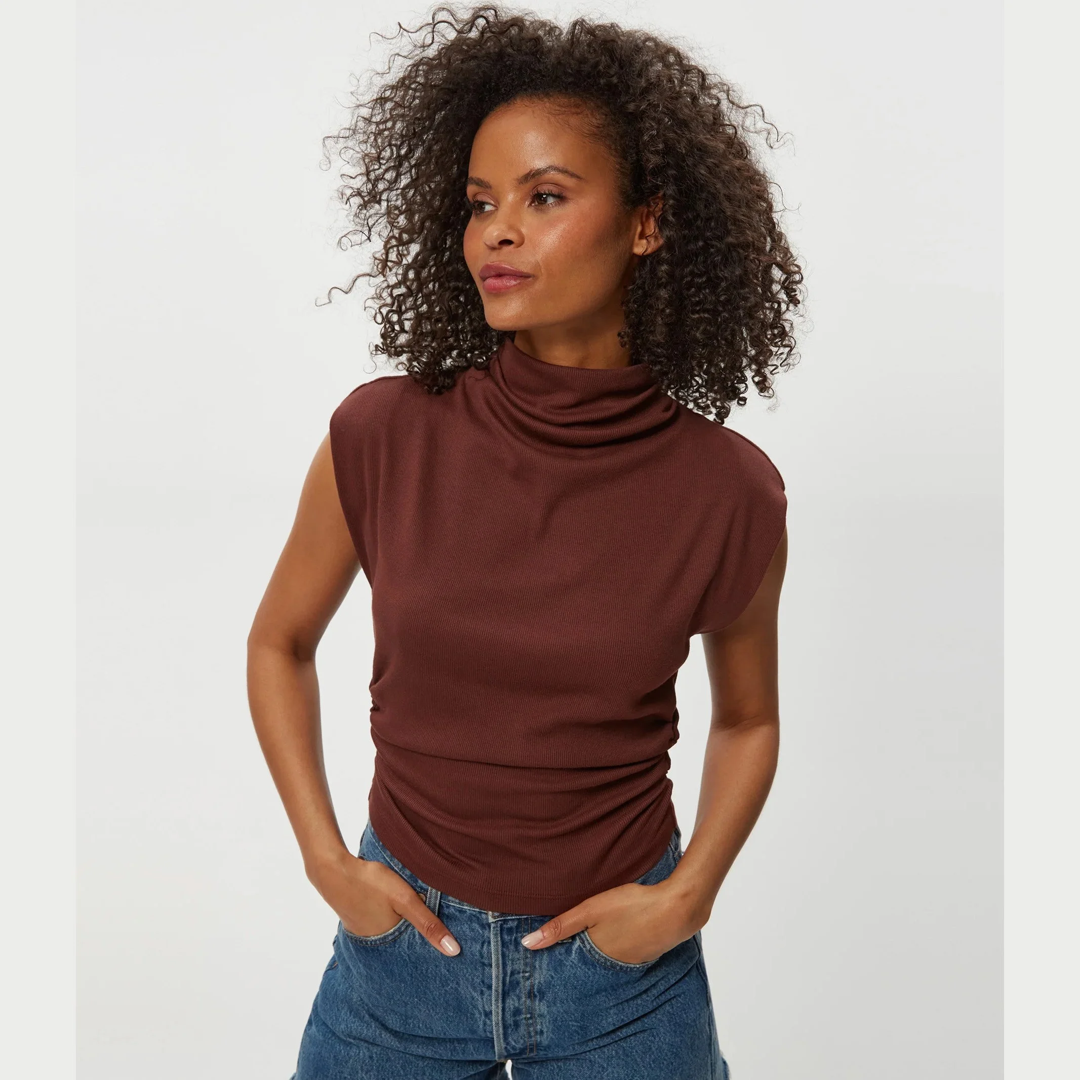 The amara mock neck power shoulder top by Michael Stars in espresso (brown) color