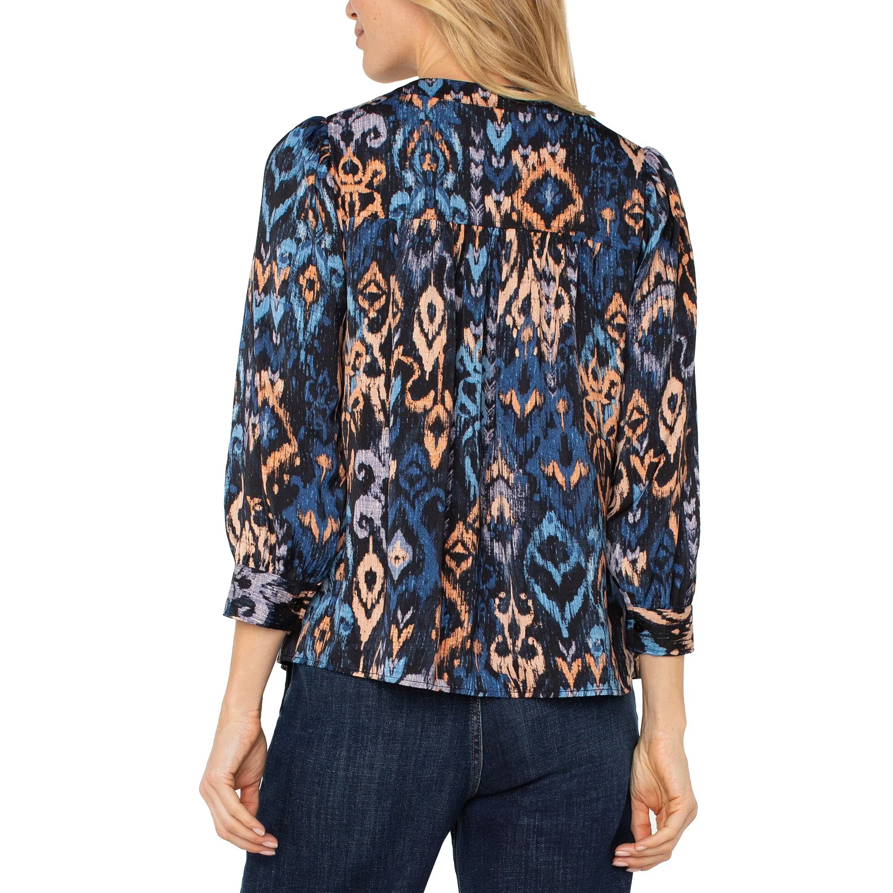 The 3/4 sleeve v-neck popover woven blouse by Liverpool in blue multi ikat print