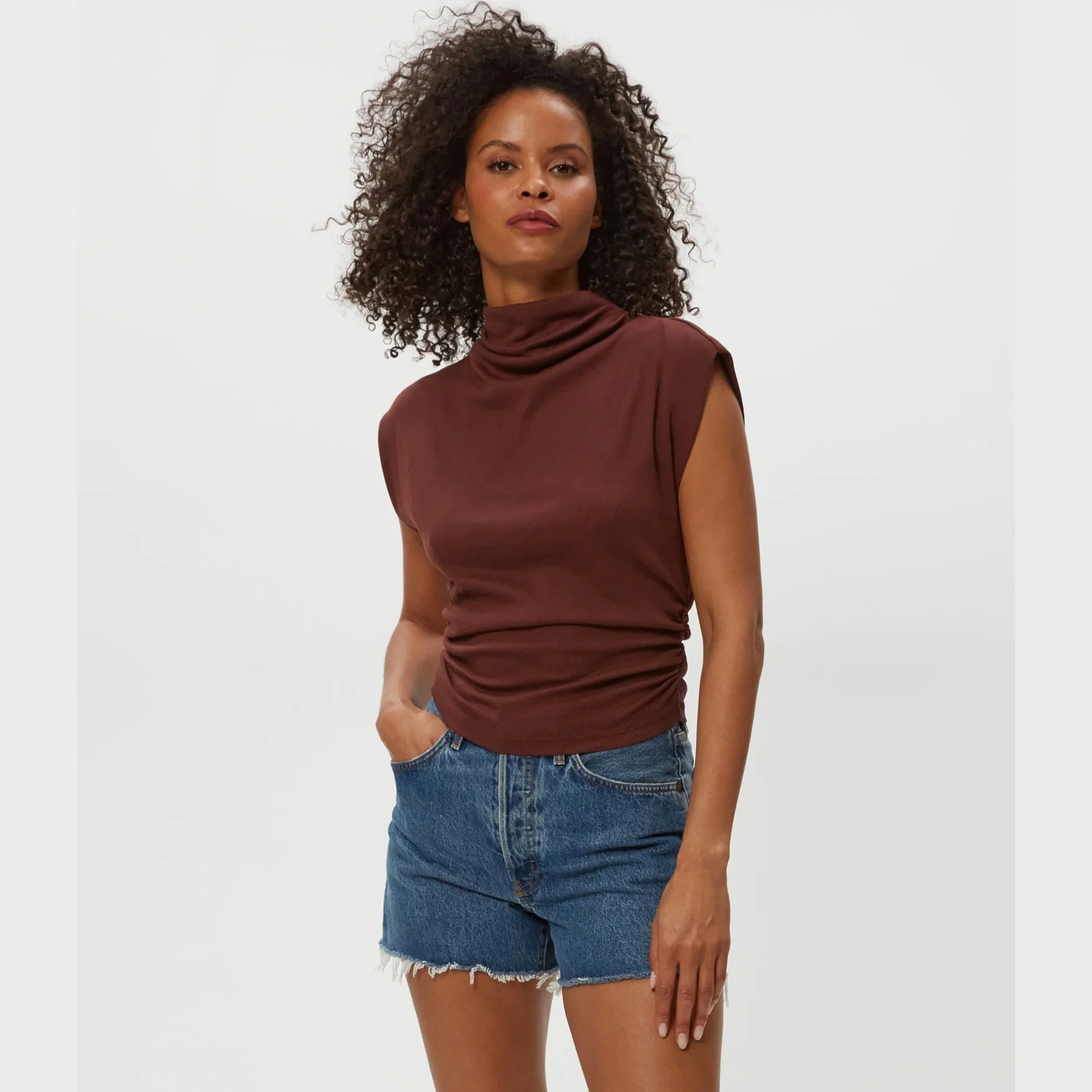 The amara mock neck power shoulder top by Michael Stars in espresso (brown) color