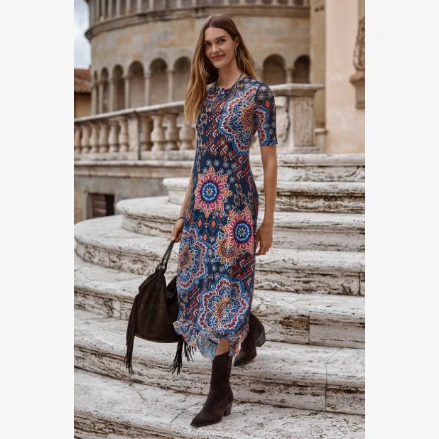 The mesh elbow sleeve asymmetric hem dress in padme print/color combination by Johnny Was