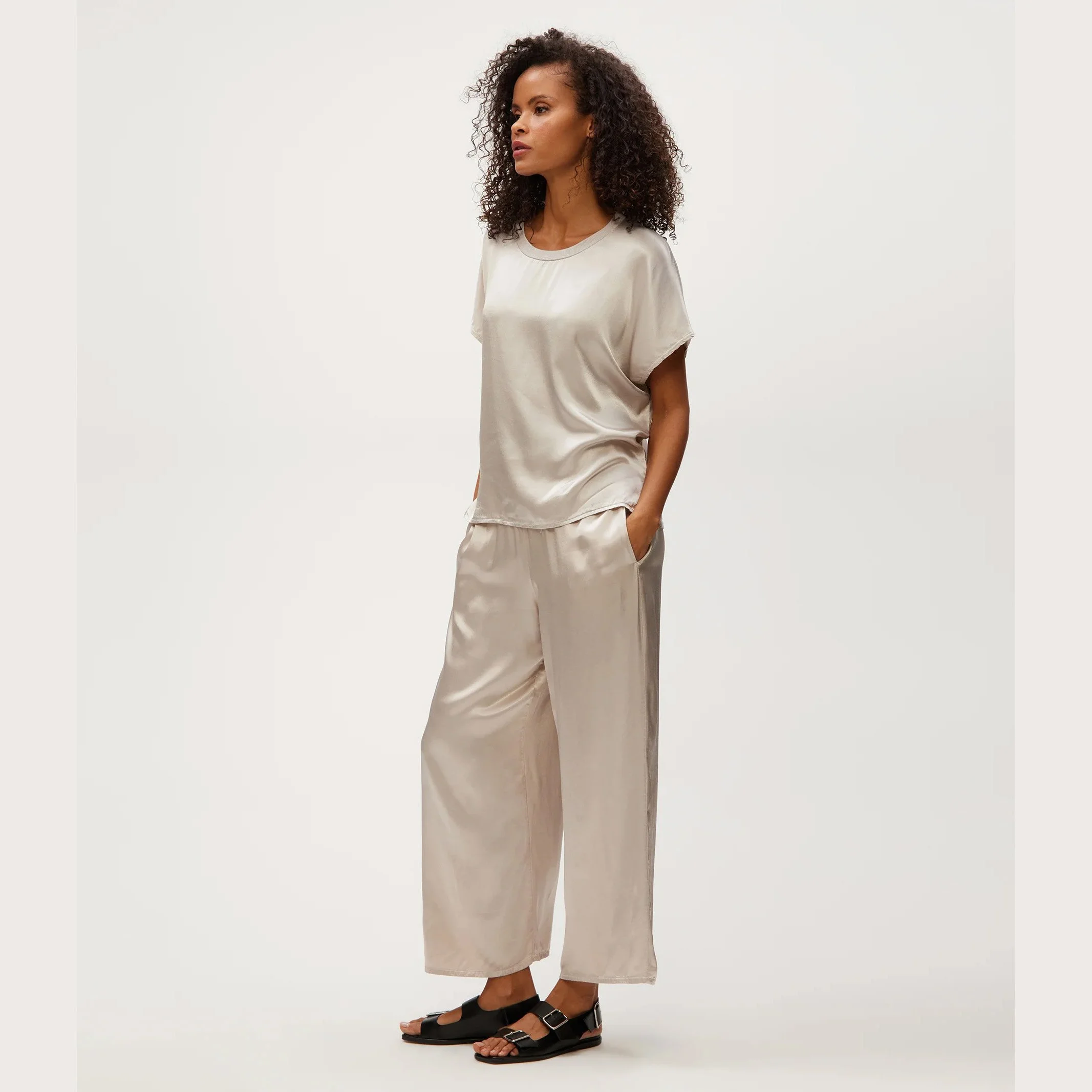 The sacha satin cropped pant by Michael Stars, in cement color, side view.