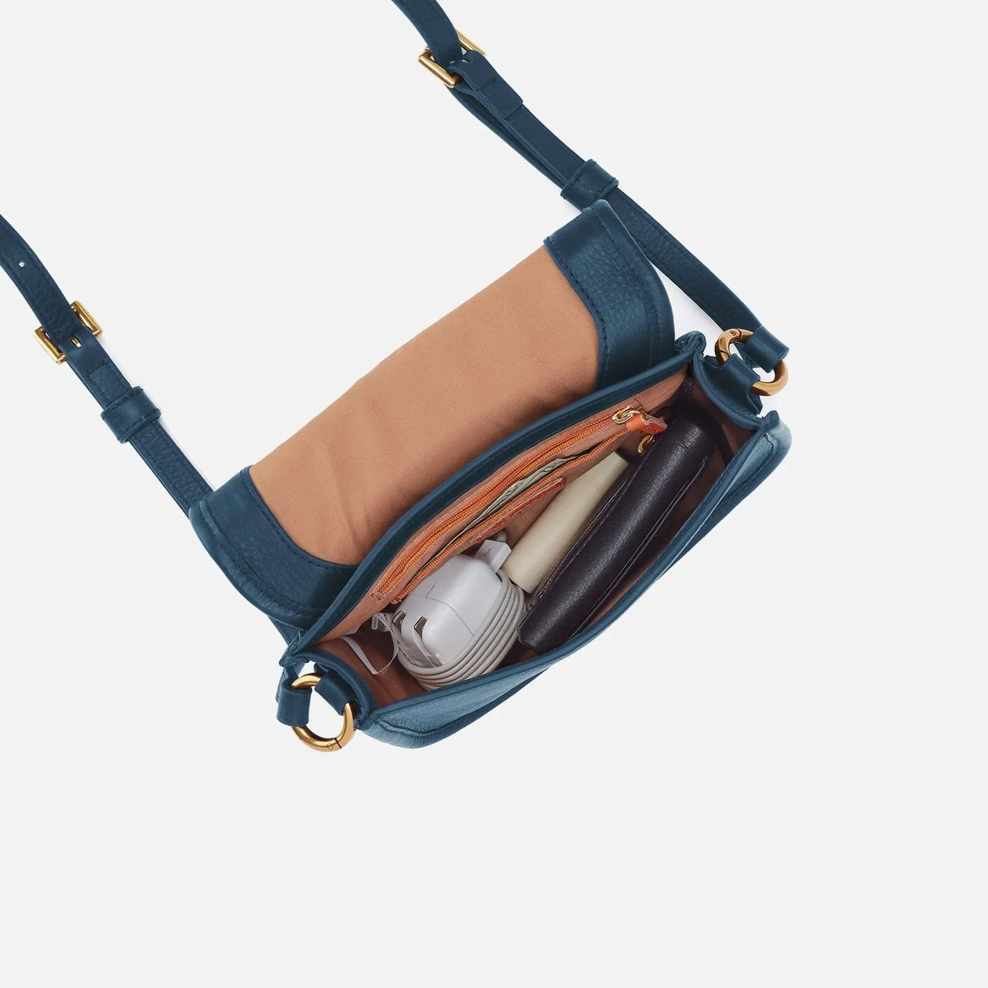 The kiva small crossbody handbag by Hobo in peacock feather colored leather