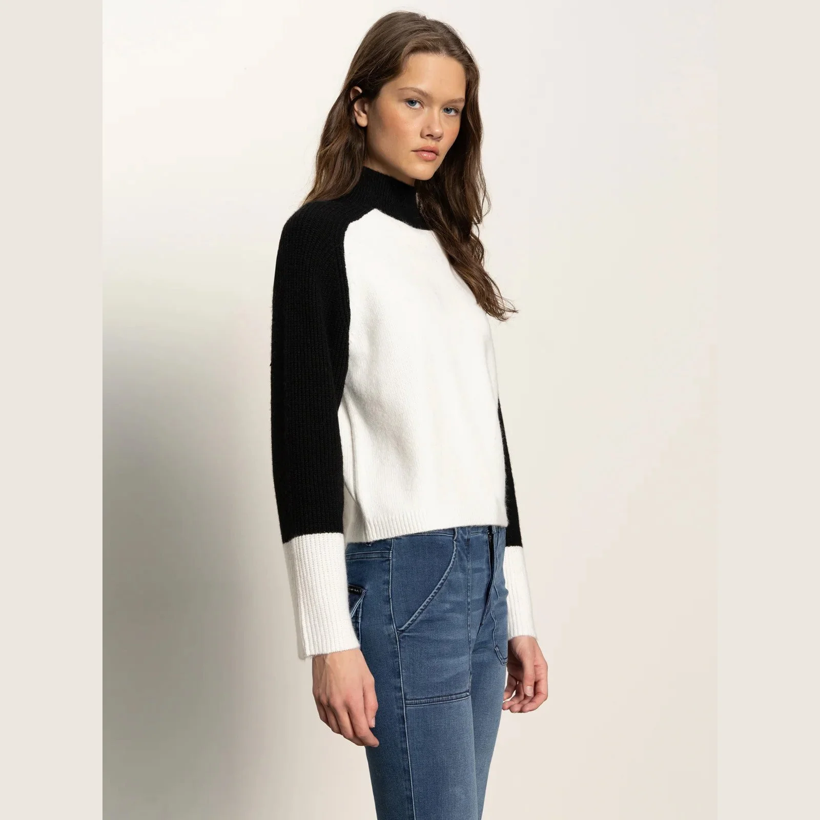 The downtown mock neck sweater by Sanctuary Clothing in black/chalk color combination
