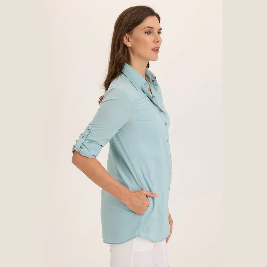 The reporter soft voile button down blouse by Wearables in ocean front color, side view