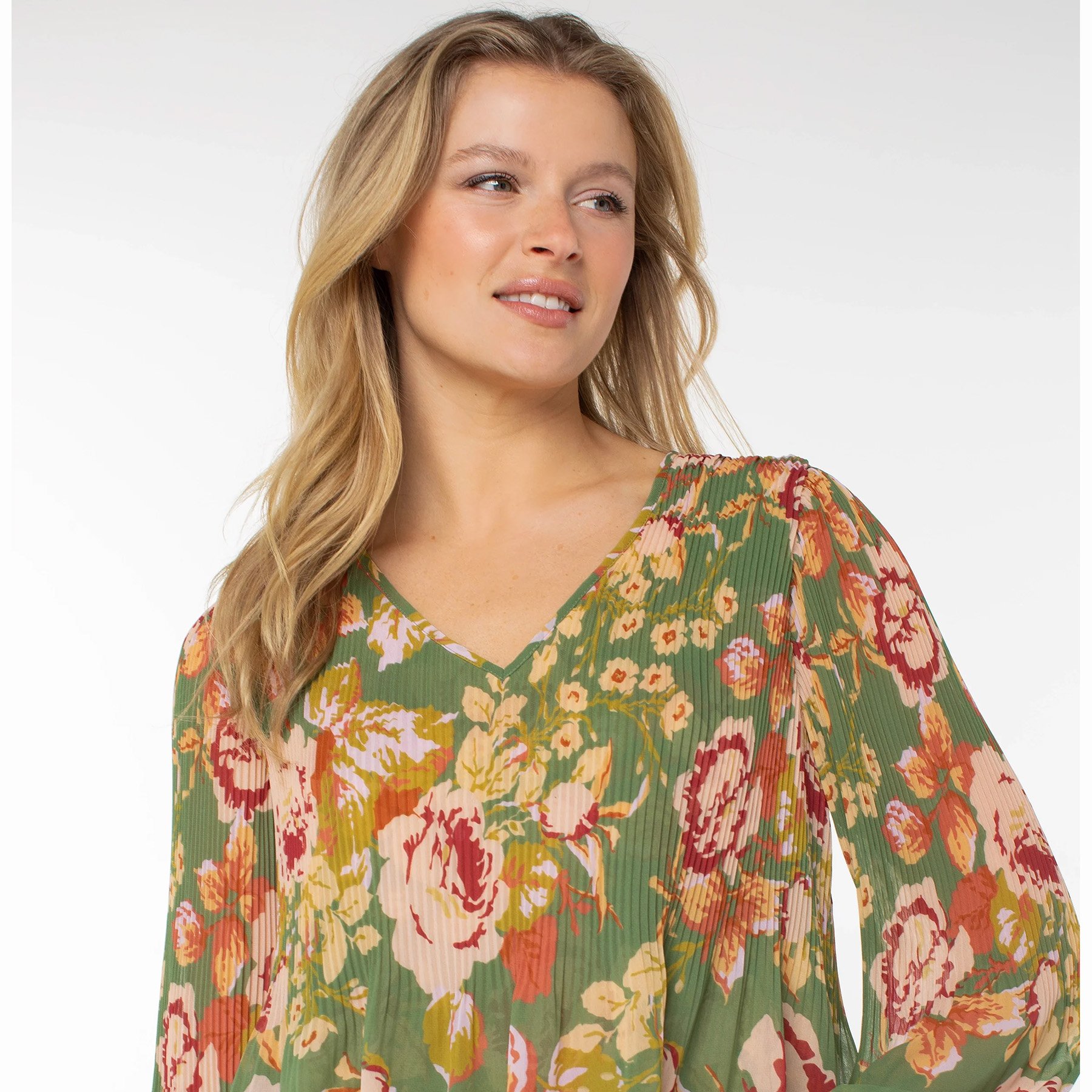 The long sleeve v-neck pleated top in green multi floral print by Liverpool LA