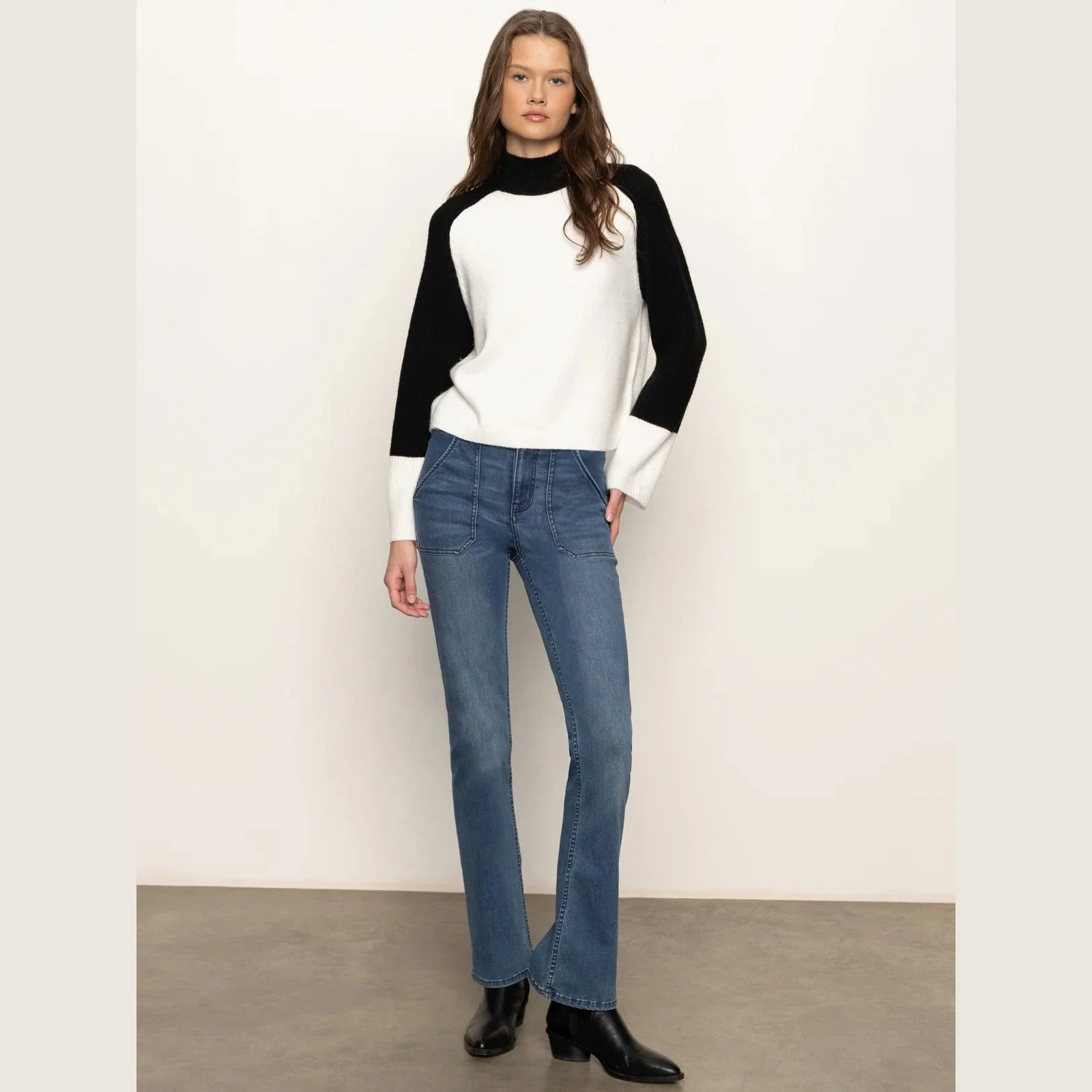 The downtown mock neck sweater by Sanctuary Clothing in black/chalk color combination