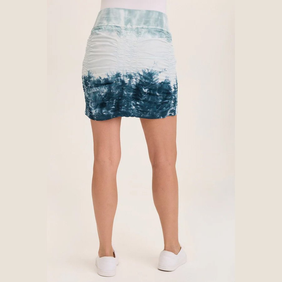 The trace skirt by Wearables clothing in tricolor ombre abyss tie-dye wash, rear view