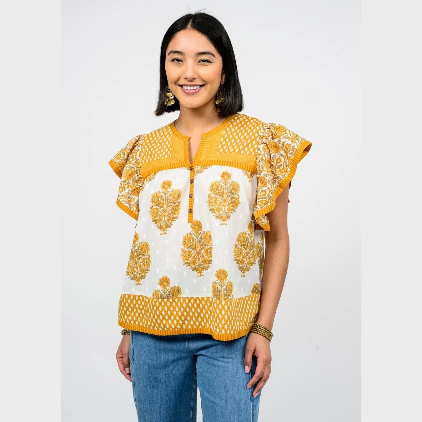 A cute top by Ivy Jane clothing, the patched patterns top in gold color combination.