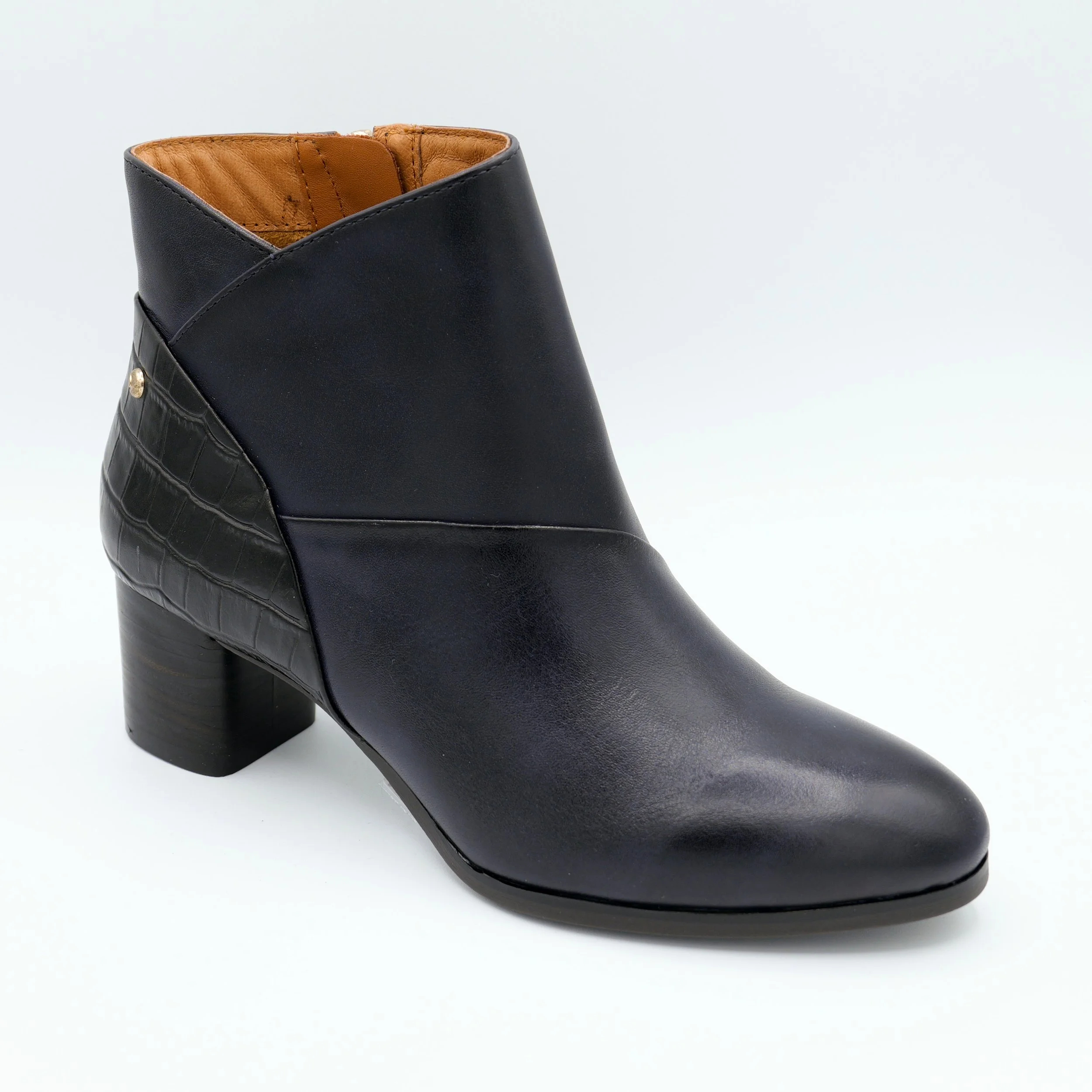 The calafat heeled bootie in space black by Pikolinos