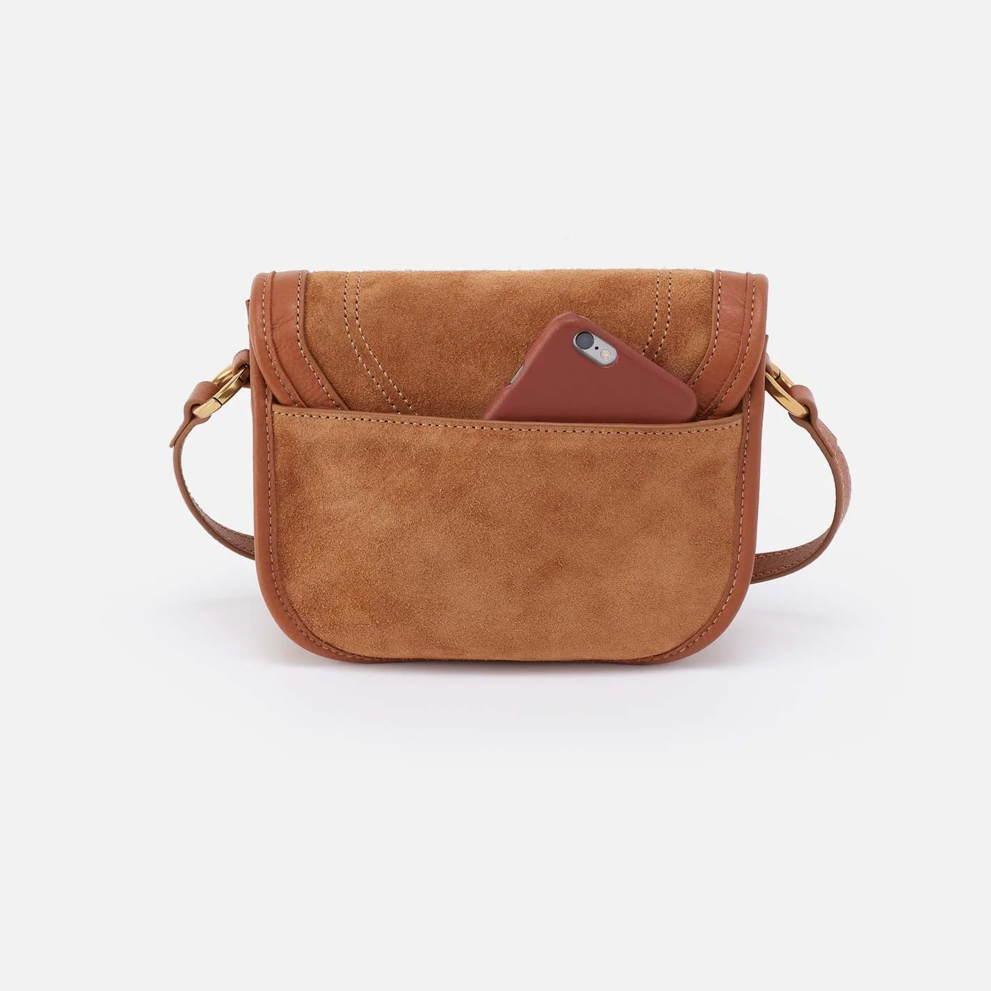 The kiva small crossbody handbag by Hobo in oak barrel colored leather